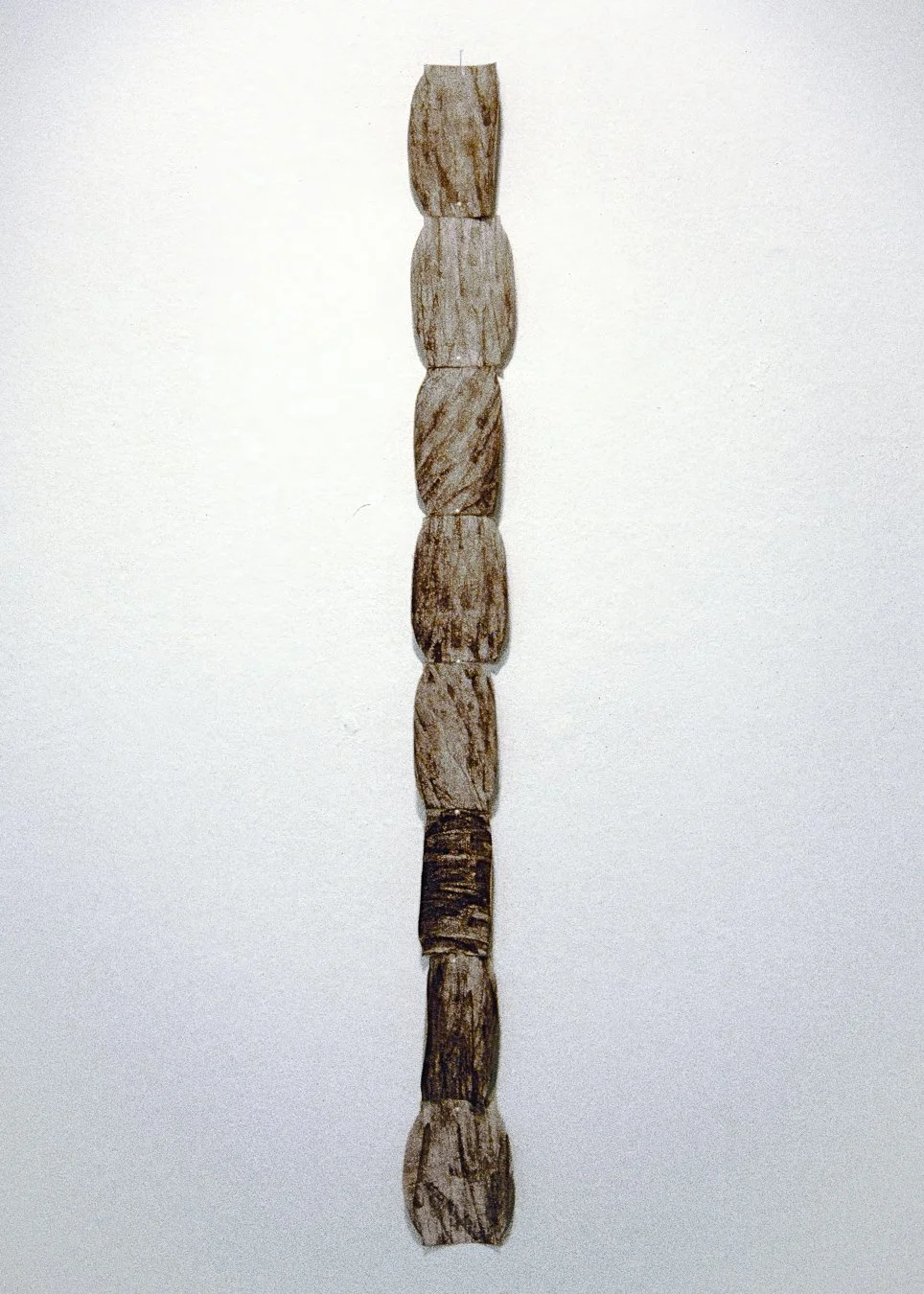 40% Obelisk, Ink on beer bottle label, 24 x 3 in., 1995