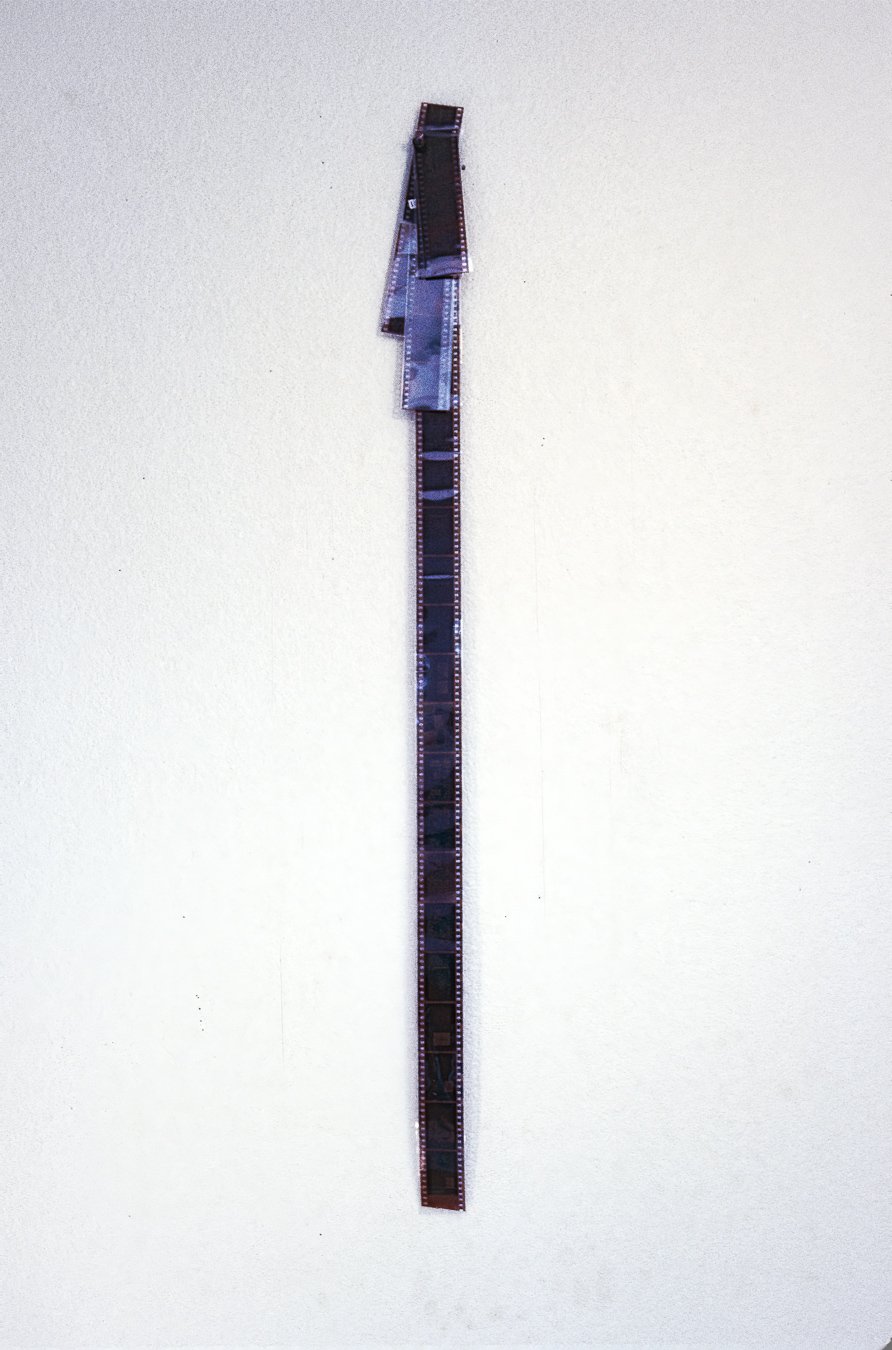 Classified Obelisk Archive 1-4 of [redacted], 35mm film negative in glassine, 32 x 1 in., 1995
