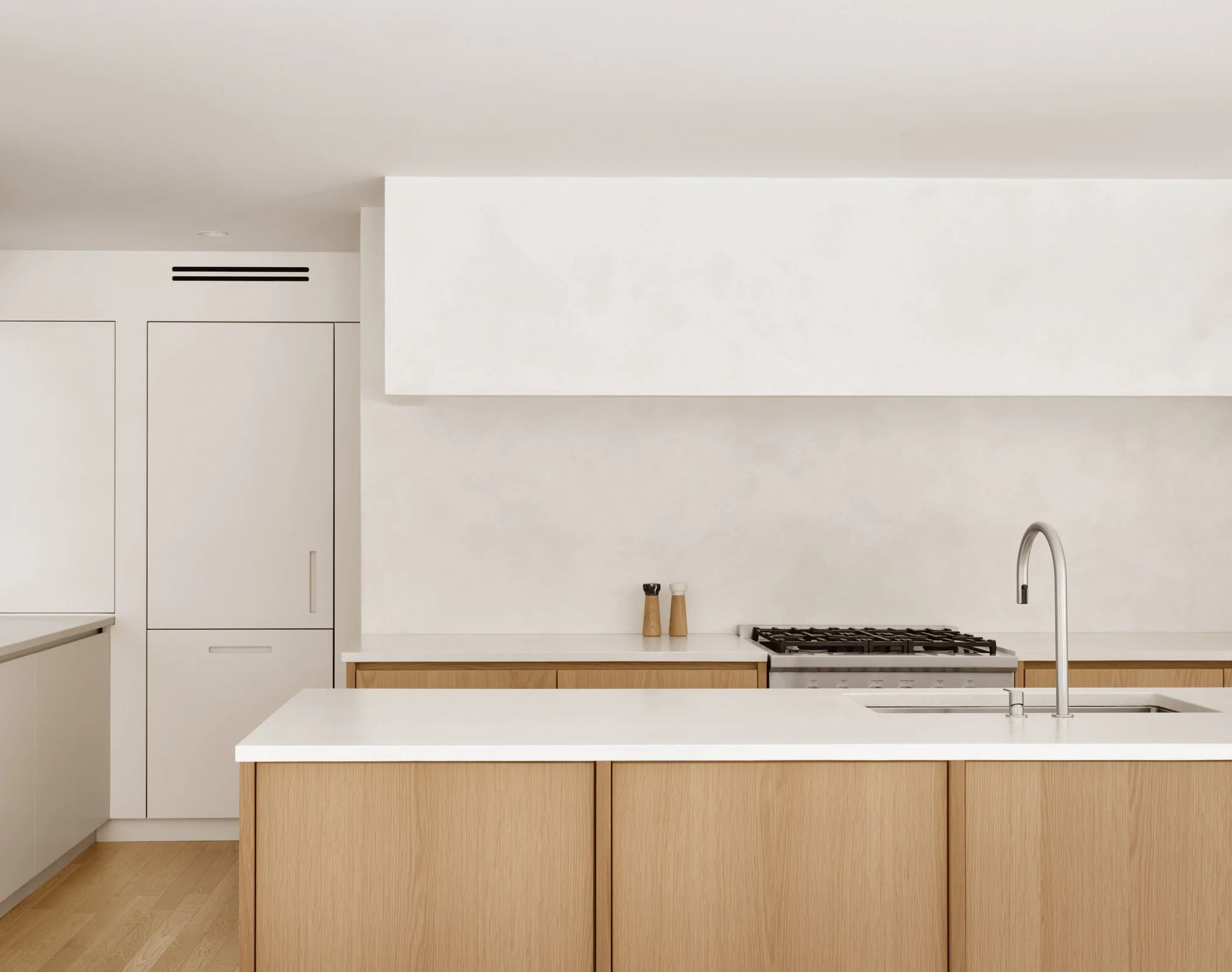 cuisine sur mesure dans un condo moderne à Montréal avec électroménagers intégrés