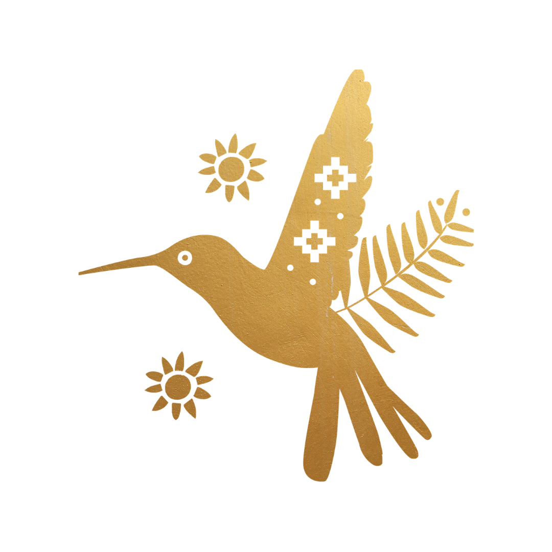 Gold-colored decorative cutout of a hummingbird holding an olive branch with three flowers around it.