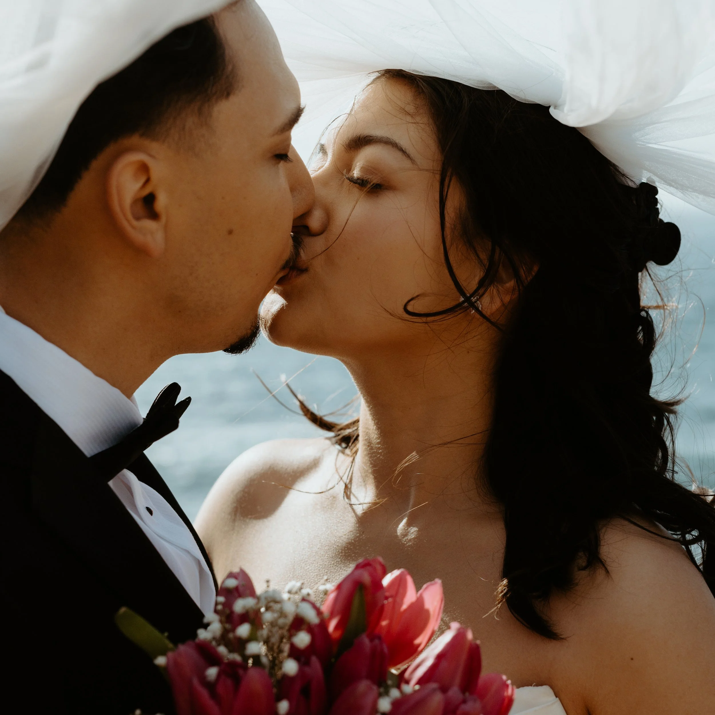 bride and groom kissing after saying "i do" at their big sur Small Wedding