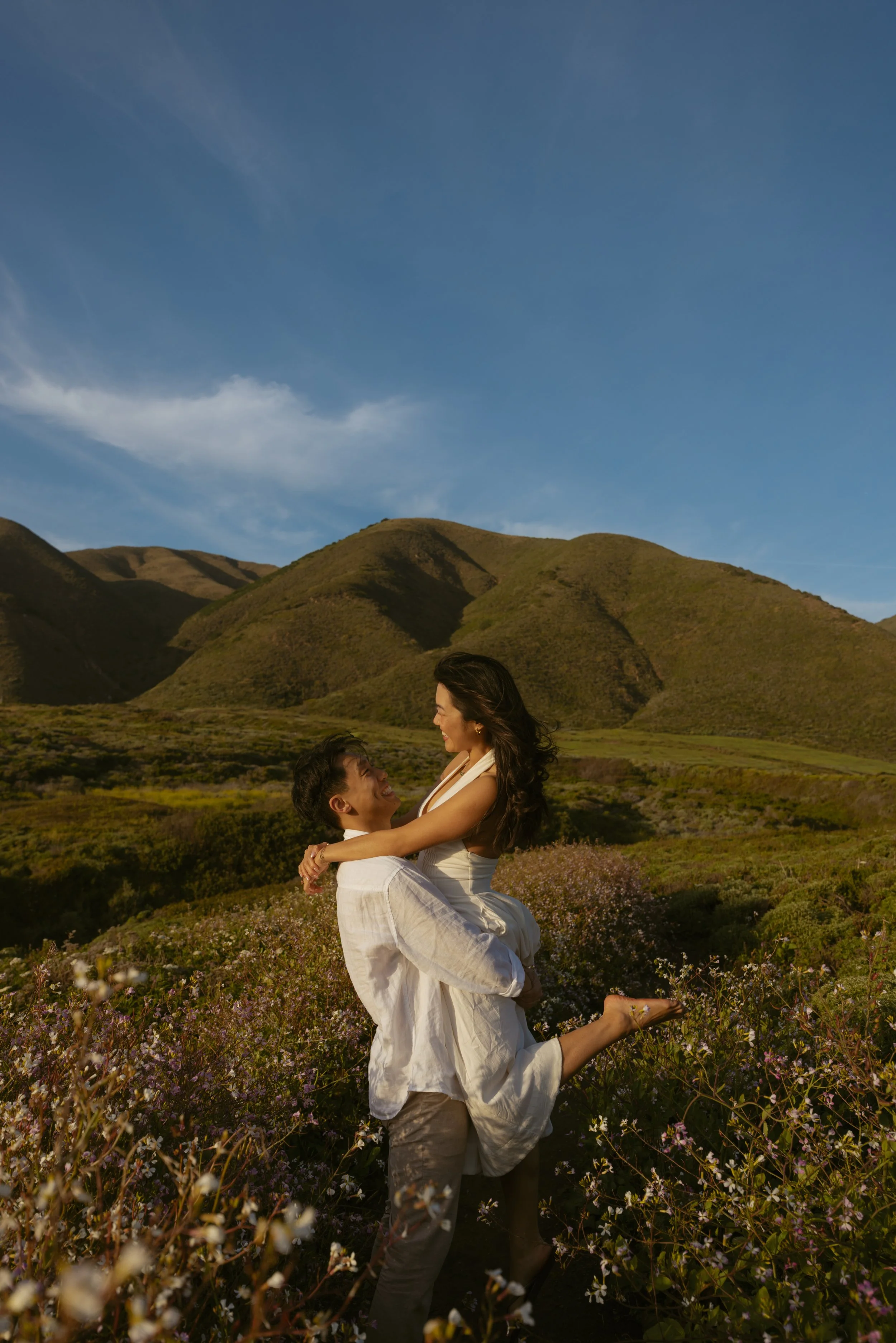 groom picking up bride after Carmel Valley Small Wedding