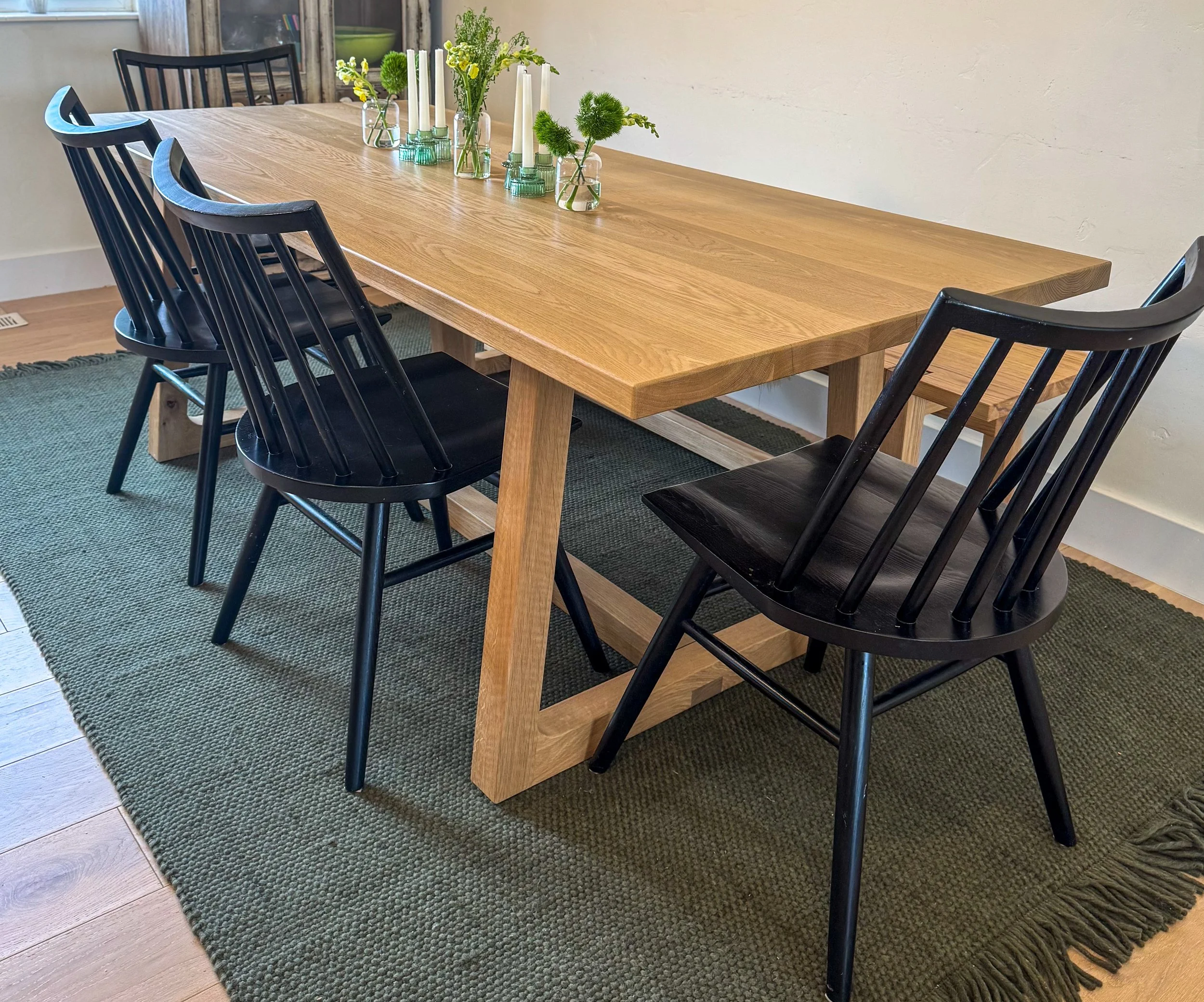 Modern bespoke white oak dining table, modern detailed handmade legs, 7 feet long, durable clear natural wood finish, Made in Midway Utah, delivered the Wasatch Back.