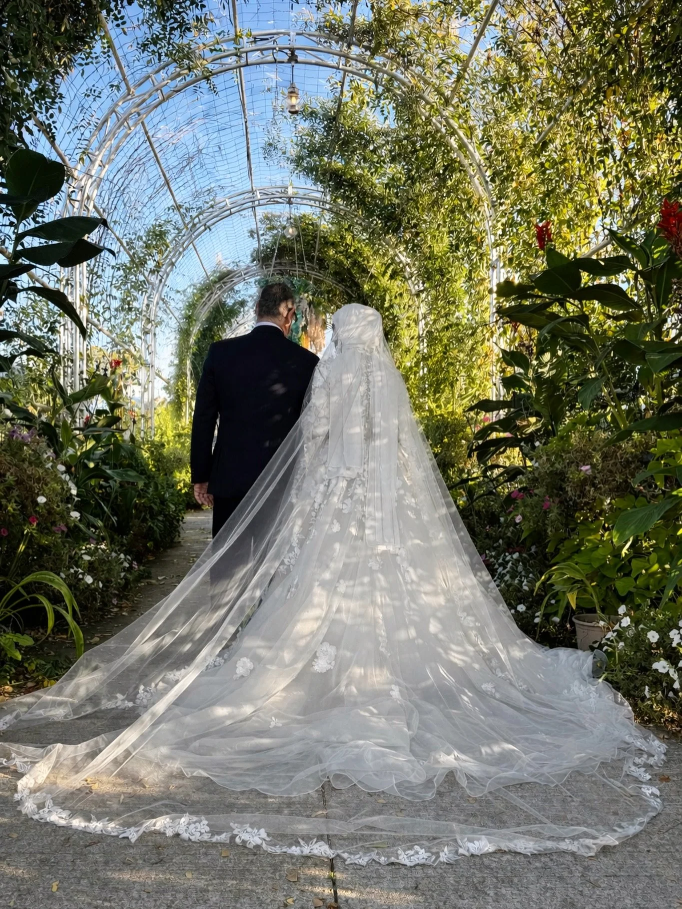 This is it.
The moment every little girl once dreamed of.
Her dress perfectly fluffed, her veil resting softly.
Walking toward her next chapter &mdash; and it&rsquo;s all so beautiful🤍