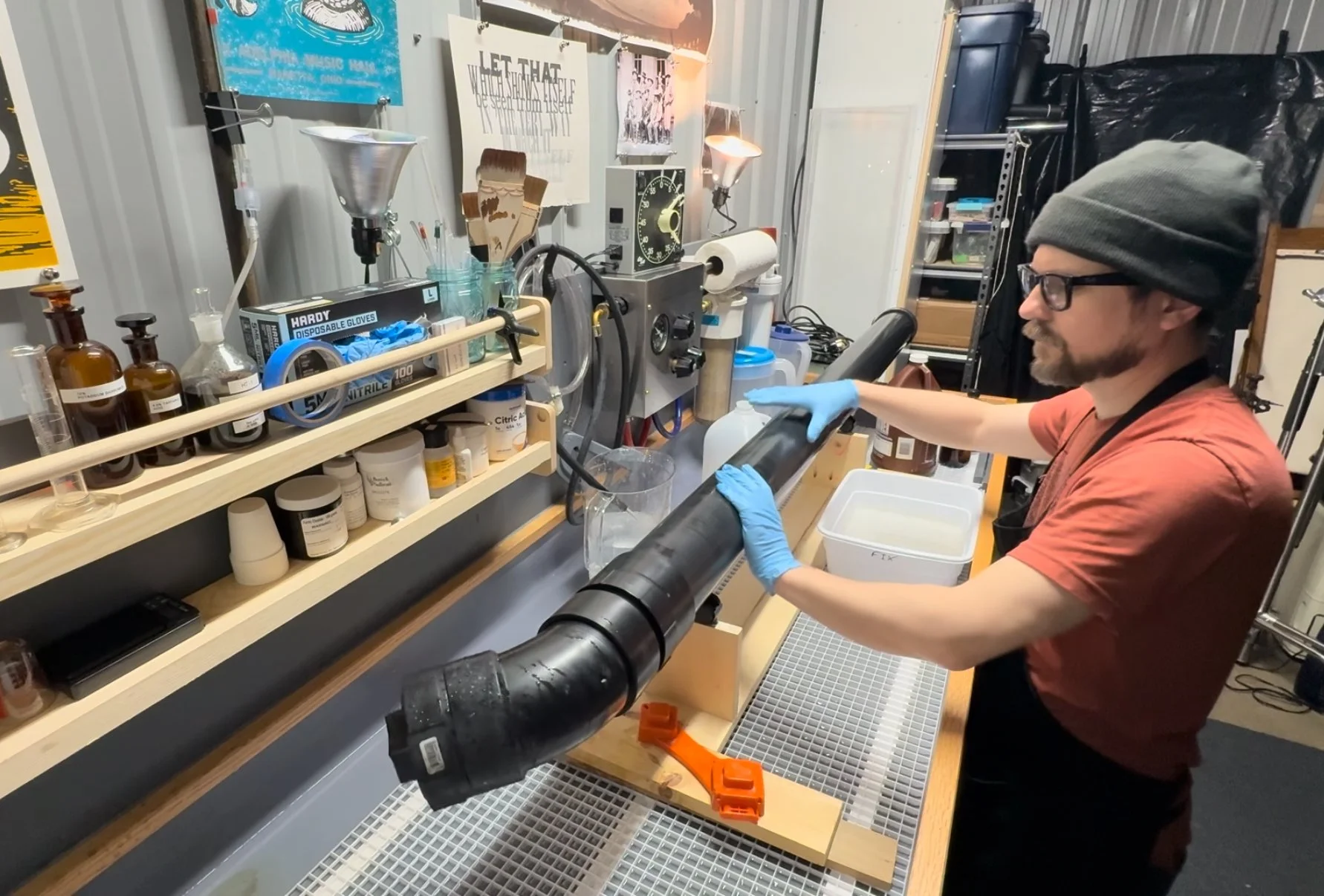 Processing a Cirkut negative in a homemade rotary tube processor.