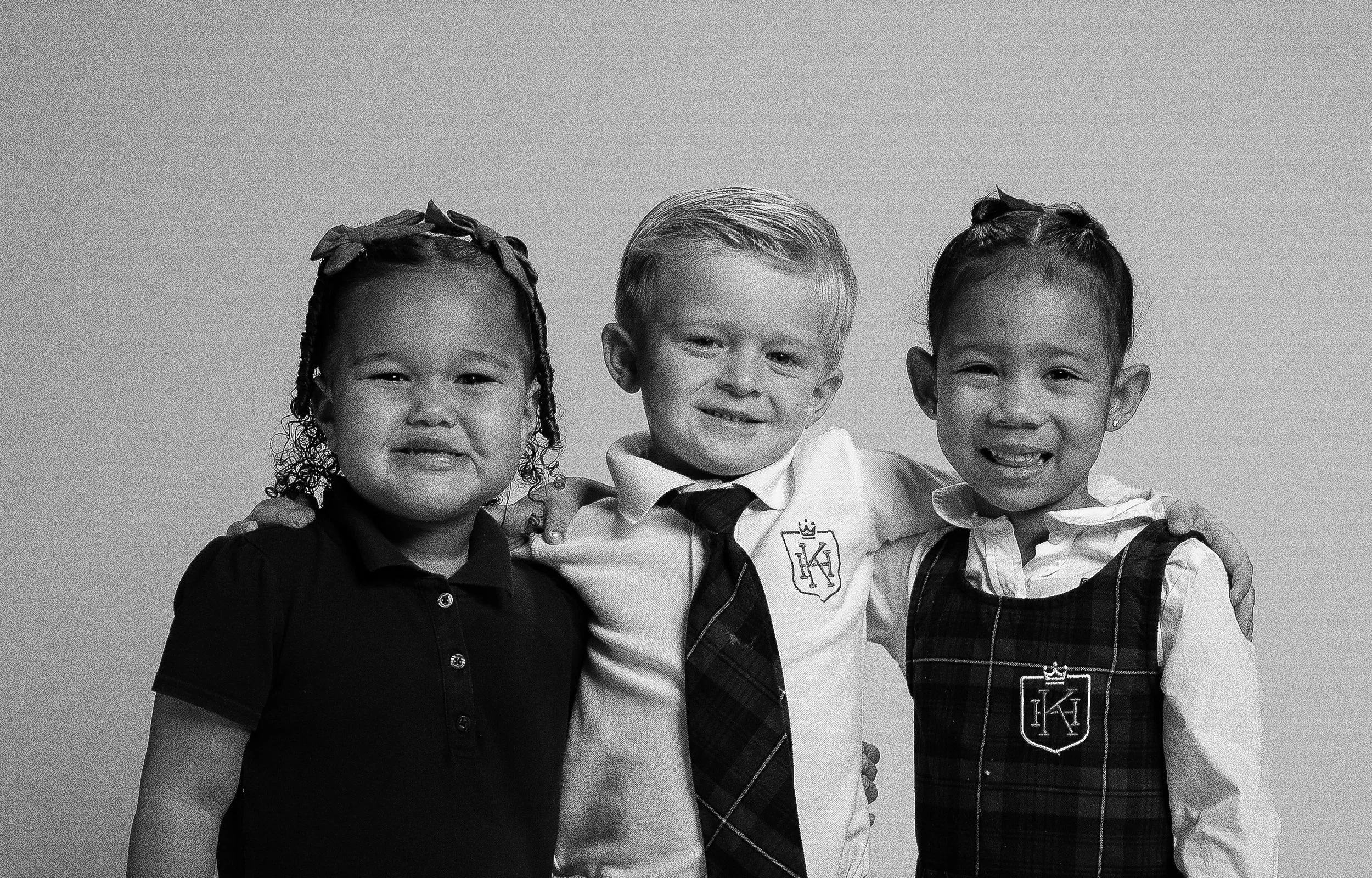 three huntsville alabama preschool aged children playing and laughing