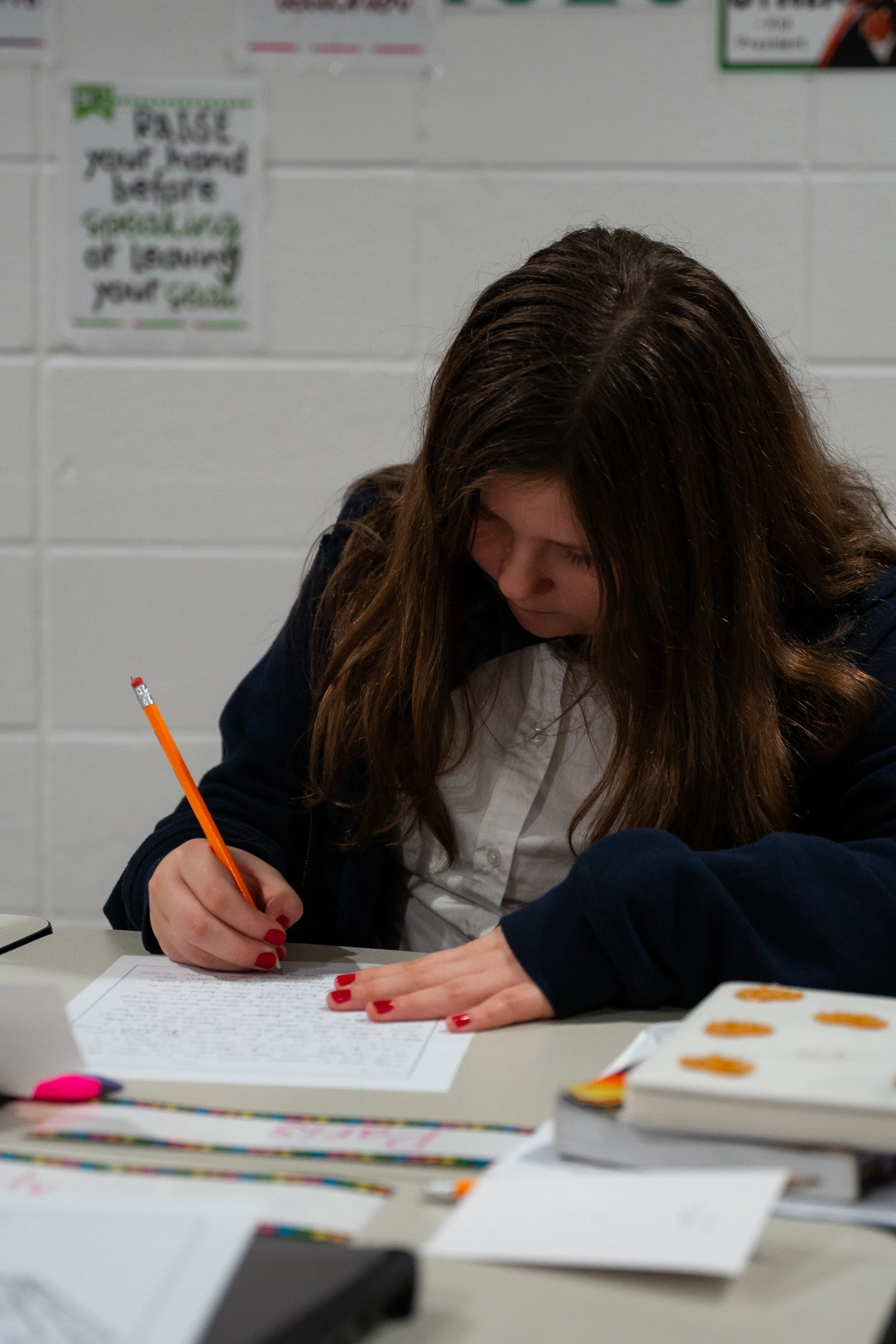A hard working elementary school student in class at Kingdom Heights Prepartory School, a private K-5 Christian school in Huntsville, Alabama.
