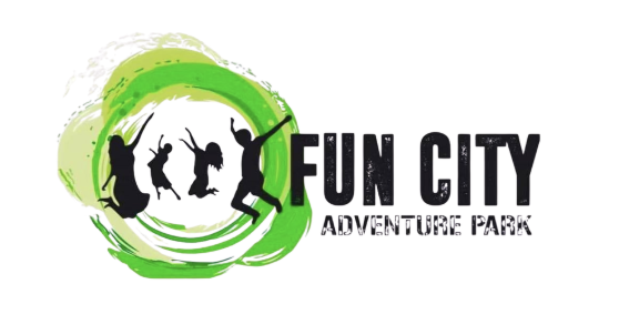 Logo for Fun City Adventure Park with silhouettes of children jumping and playing inside a green circular splash.