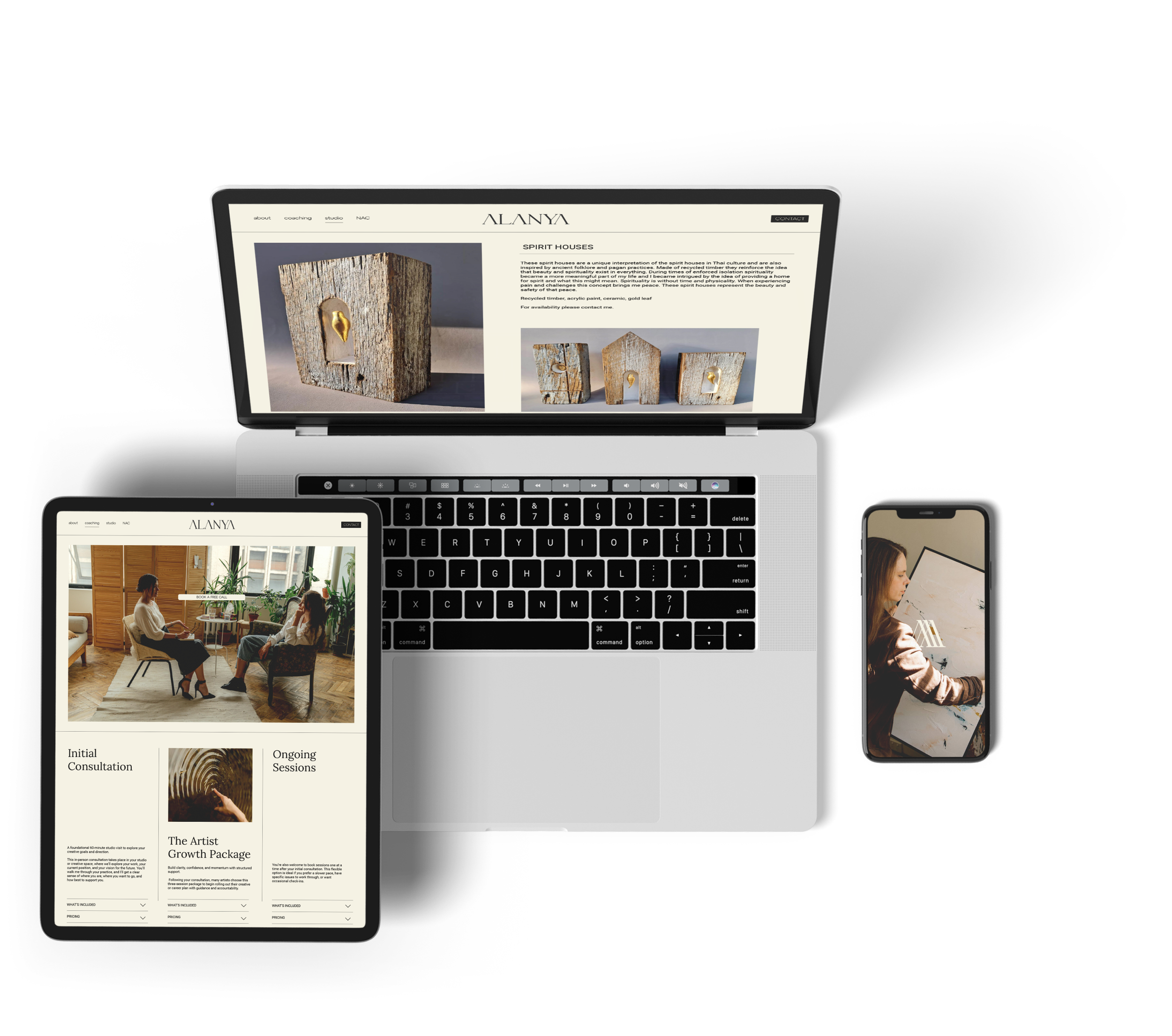 A MacBook laptop displaying a website about spirit houses, with a tablet and a smartphone also showing different web pages on a black background.