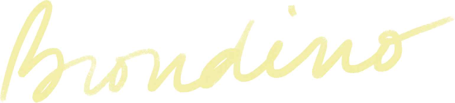 Close-up of a stylised Brondino signature in pale yellow against a black background.