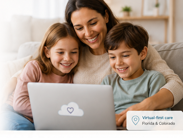 family using laptop for virtual pediatric care with you and me pediatrics