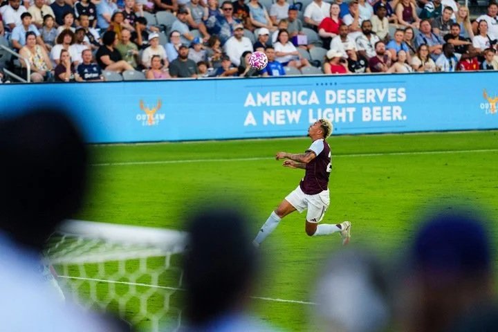 Soccer Field Outlaw Beer Signage