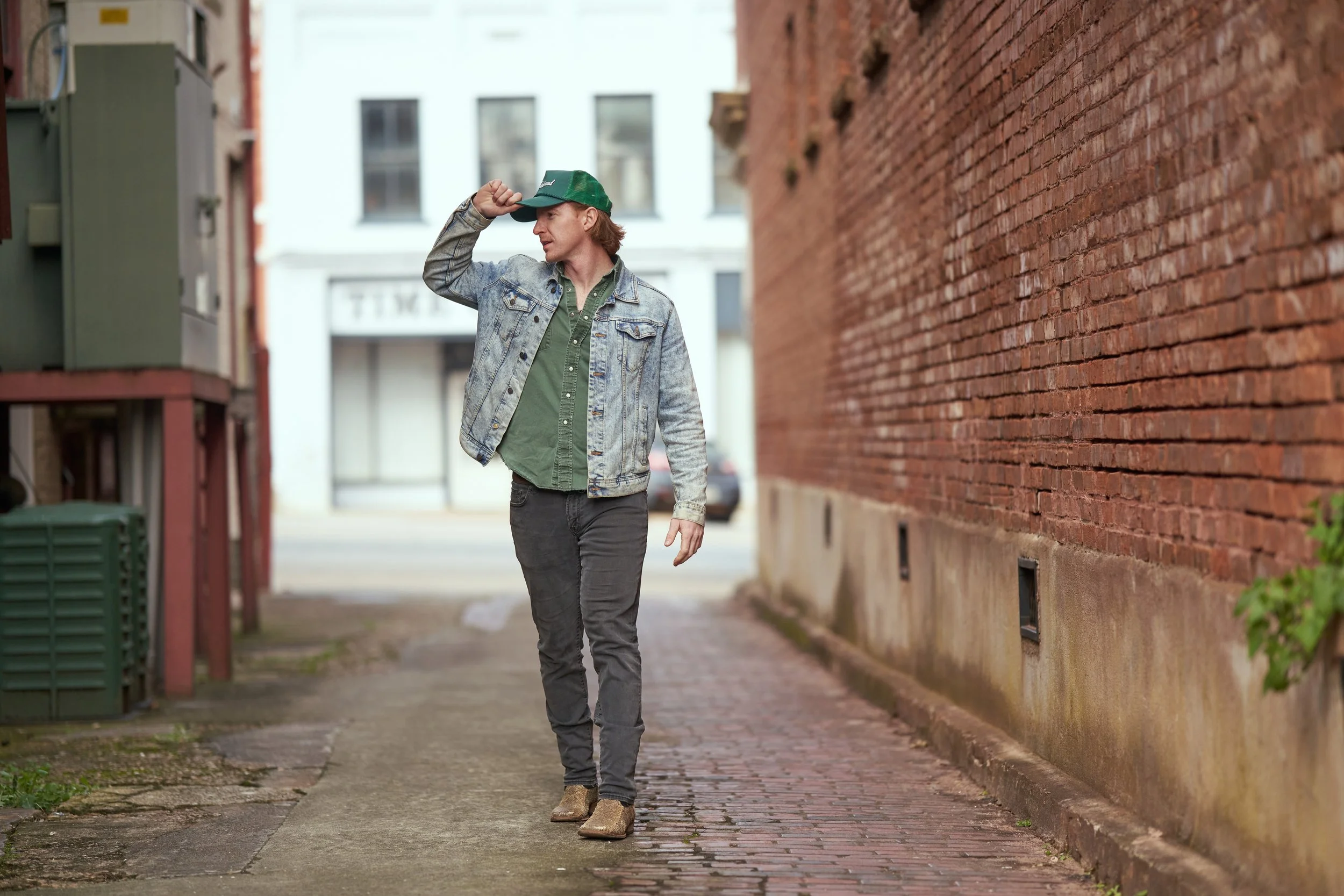 country artist walking small town.jpg