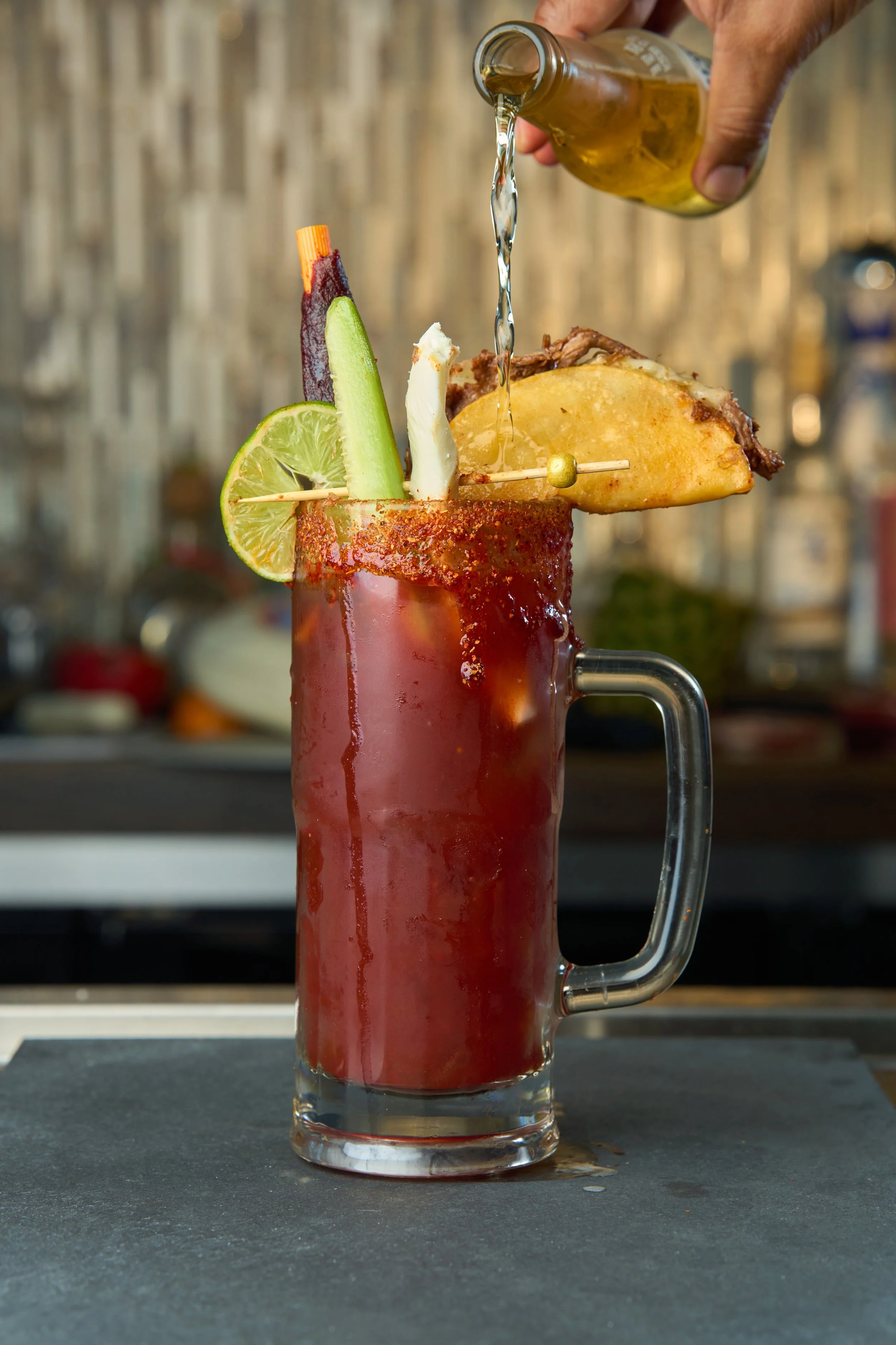 traditional tall mexican drink with taco.jpg