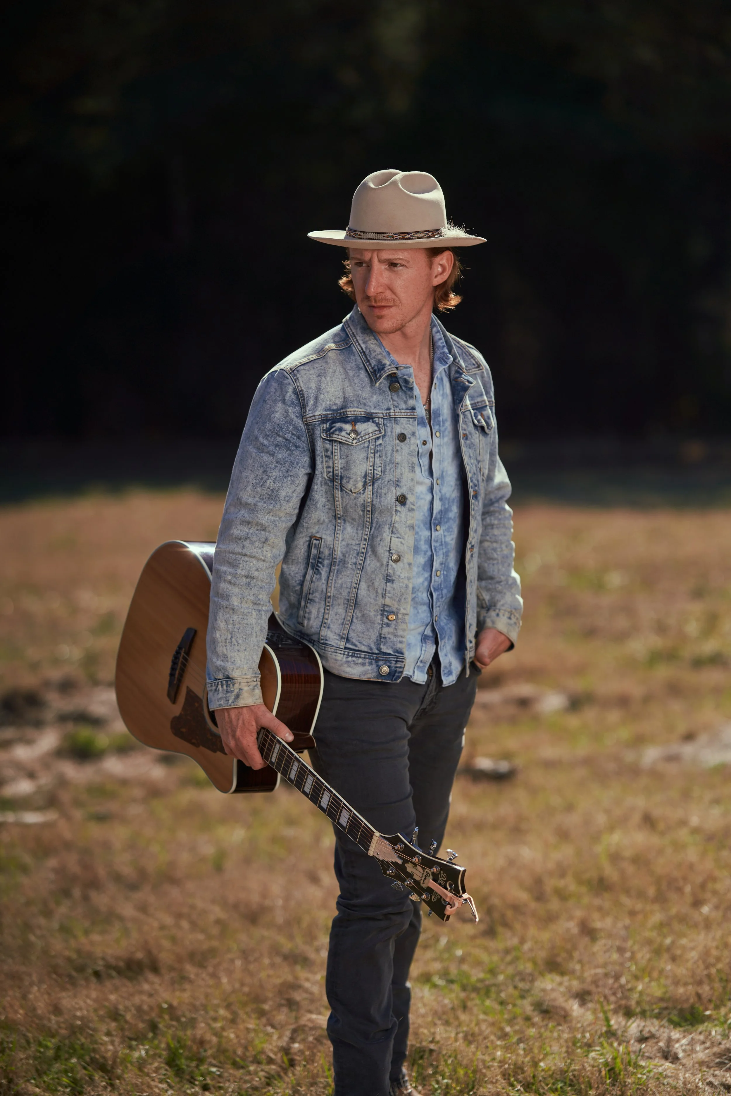 country artist dramitic with guitar .jpg