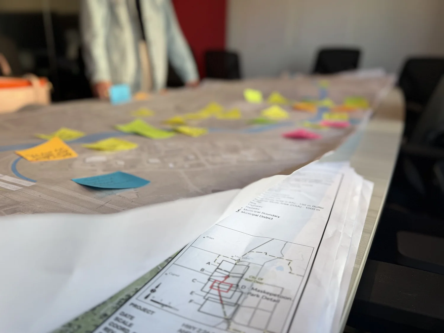reVerb team mapping stakeholder input on a project map