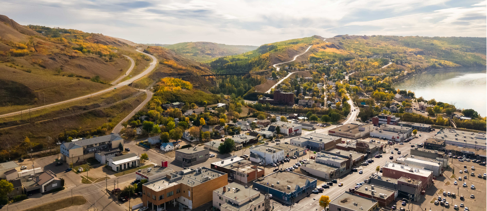 Aerial view of Peace River, Alberta, with the highway winding down the valley into town