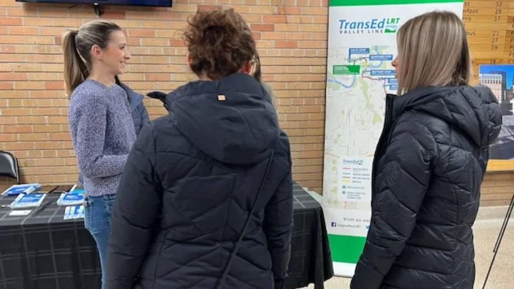 reVerb team reviewing a project map with community members