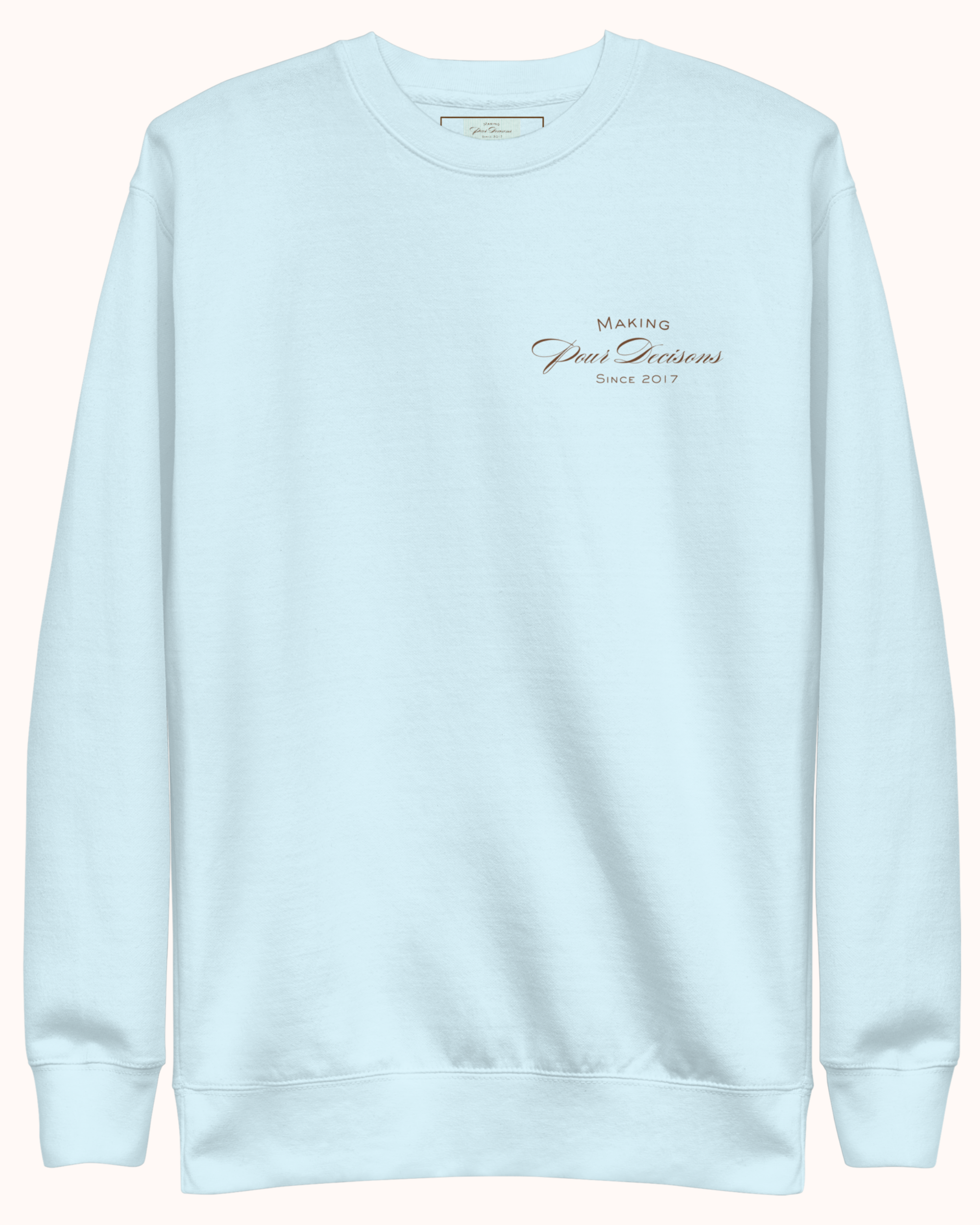 Premium wine sweatshirt with “Making Pour Decisions Since 2017” on the front and The Real Wine Snobs logo on the back. Structured unisex fit with cotton face and fleece interior. Sizes S–3XL.
