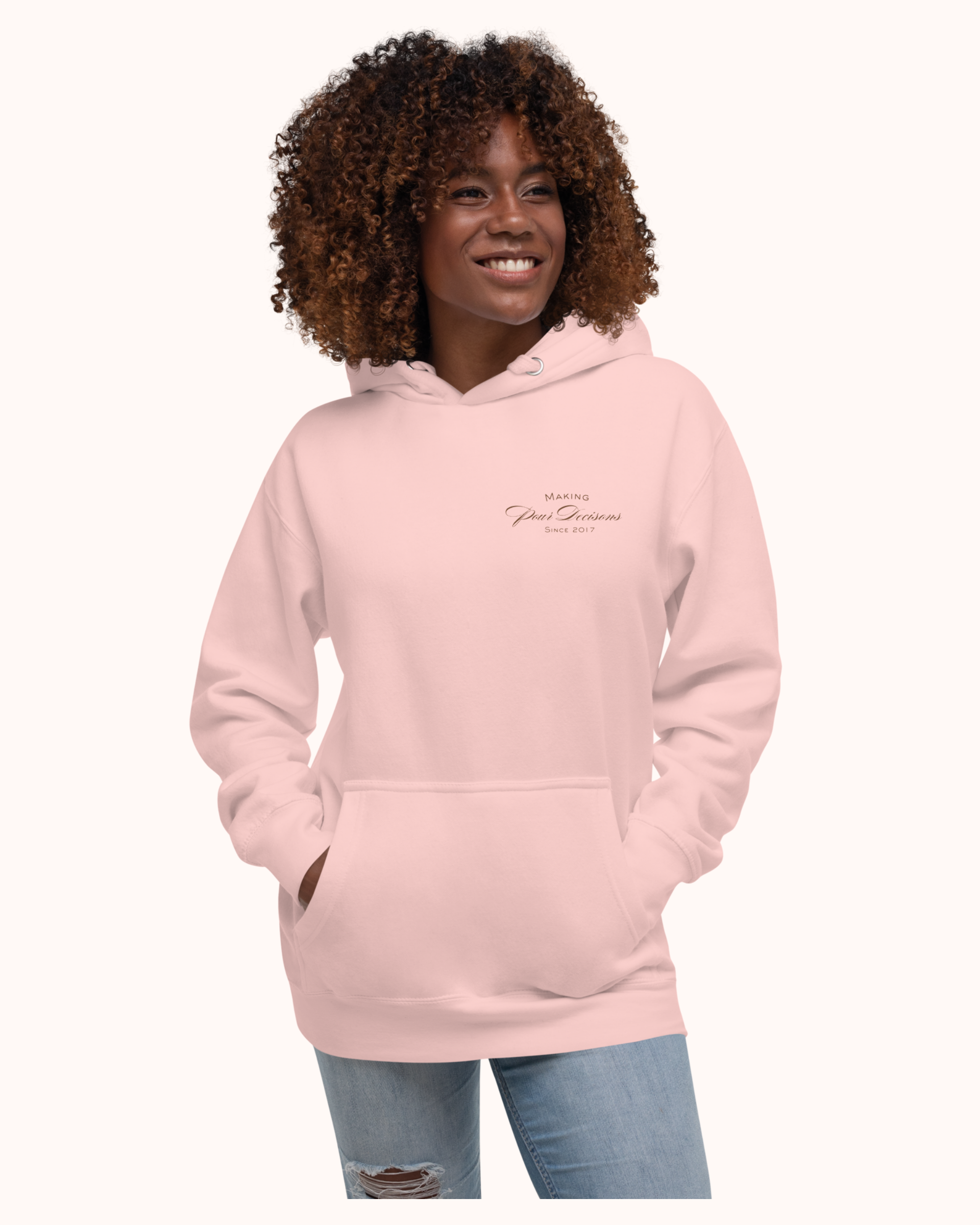 The Real Wine Snobs Snob Hoodie features women raising wine glasses beneath the brand crest. A fleece-lined hoodie designed for tastings, girls’ nights, and wine lovers with a little attitude.