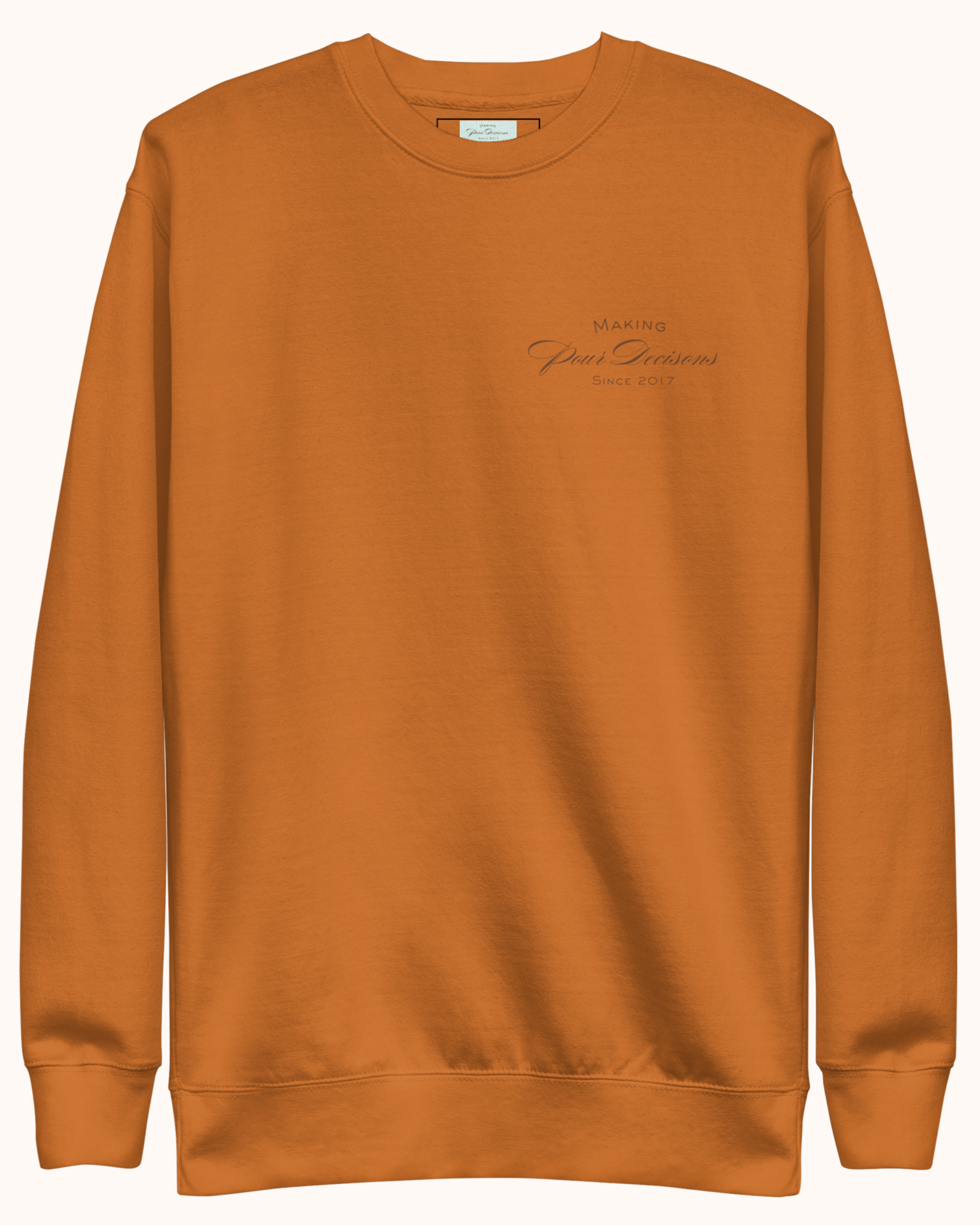 Premium wine sweatshirt with “Making Pour Decisions Since 2017” on the front and The Real Wine Snobs logo on the back. Structured unisex fit with cotton face and fleece interior. Sizes S–3XL.