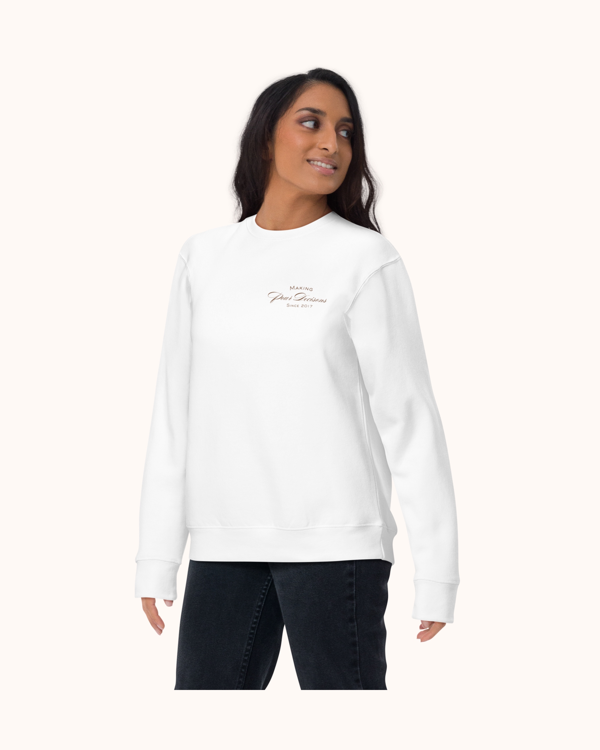 Premium wine sweatshirt with “Making Pour Decisions Since 2017” on the front and logo on back. Structured unisex fit, cotton face, fleece interior. Sizes S–3XL.