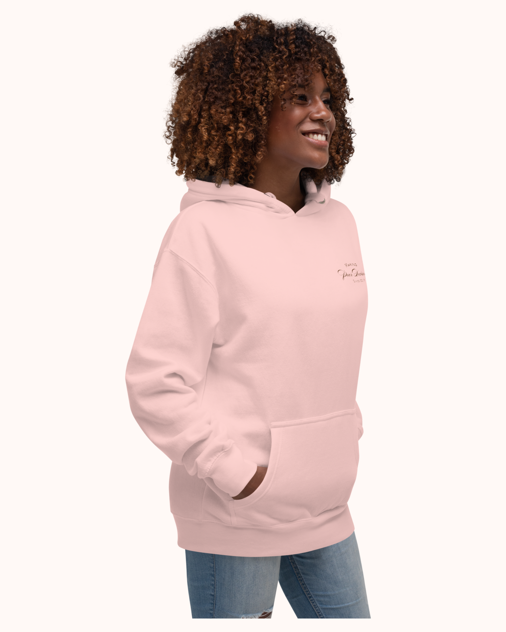The Real Wine Snobs Snob Hoodie features women raising wine glasses beneath the brand crest. A fleece-lined hoodie designed for tastings, girls’ nights, and wine lovers with a little attitude.