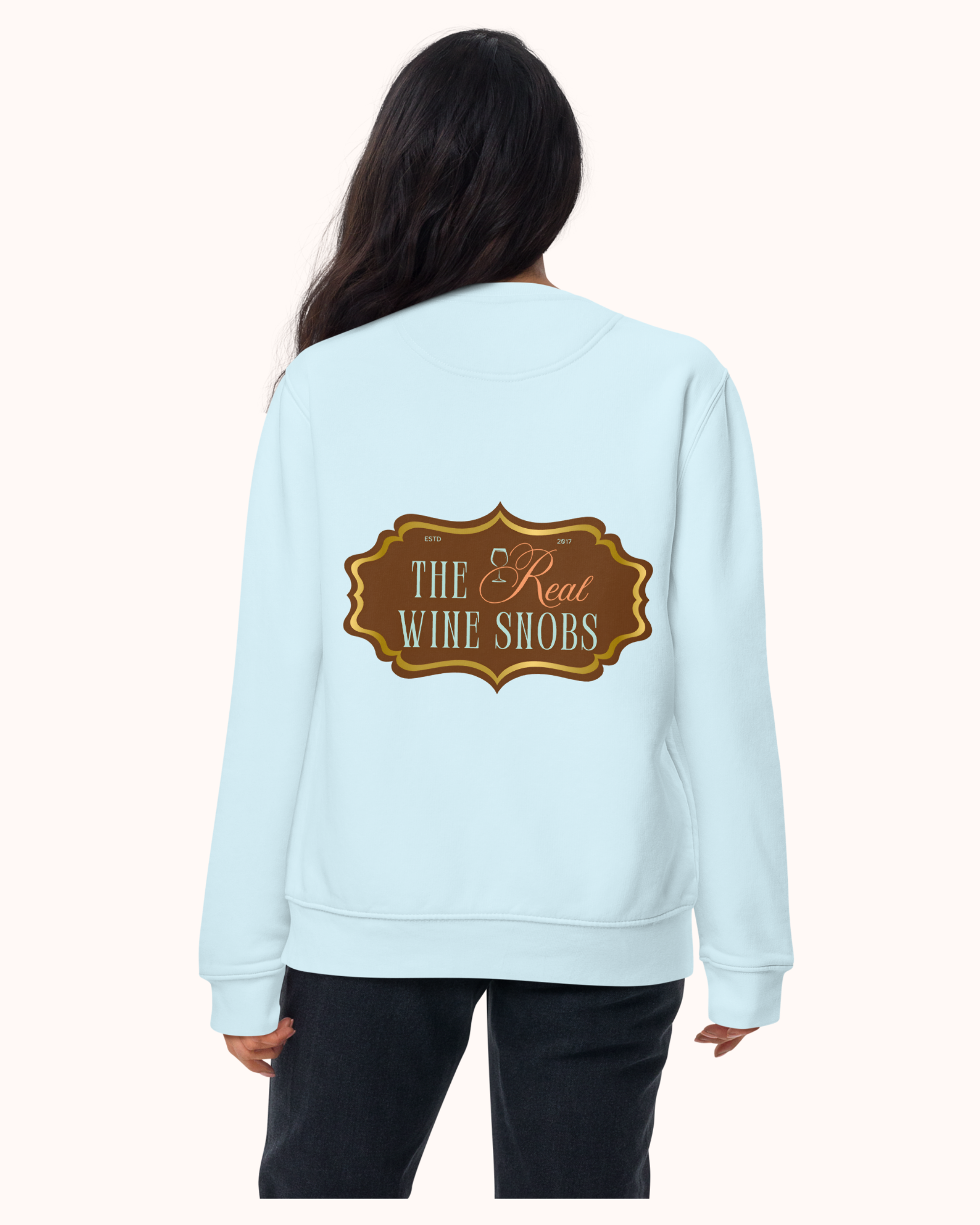 Premium wine sweatshirt with “Making Pour Decisions Since 2017” on the front and The Real Wine Snobs logo on the back. Structured unisex fit with cotton face and fleece interior. Sizes S–3XL.