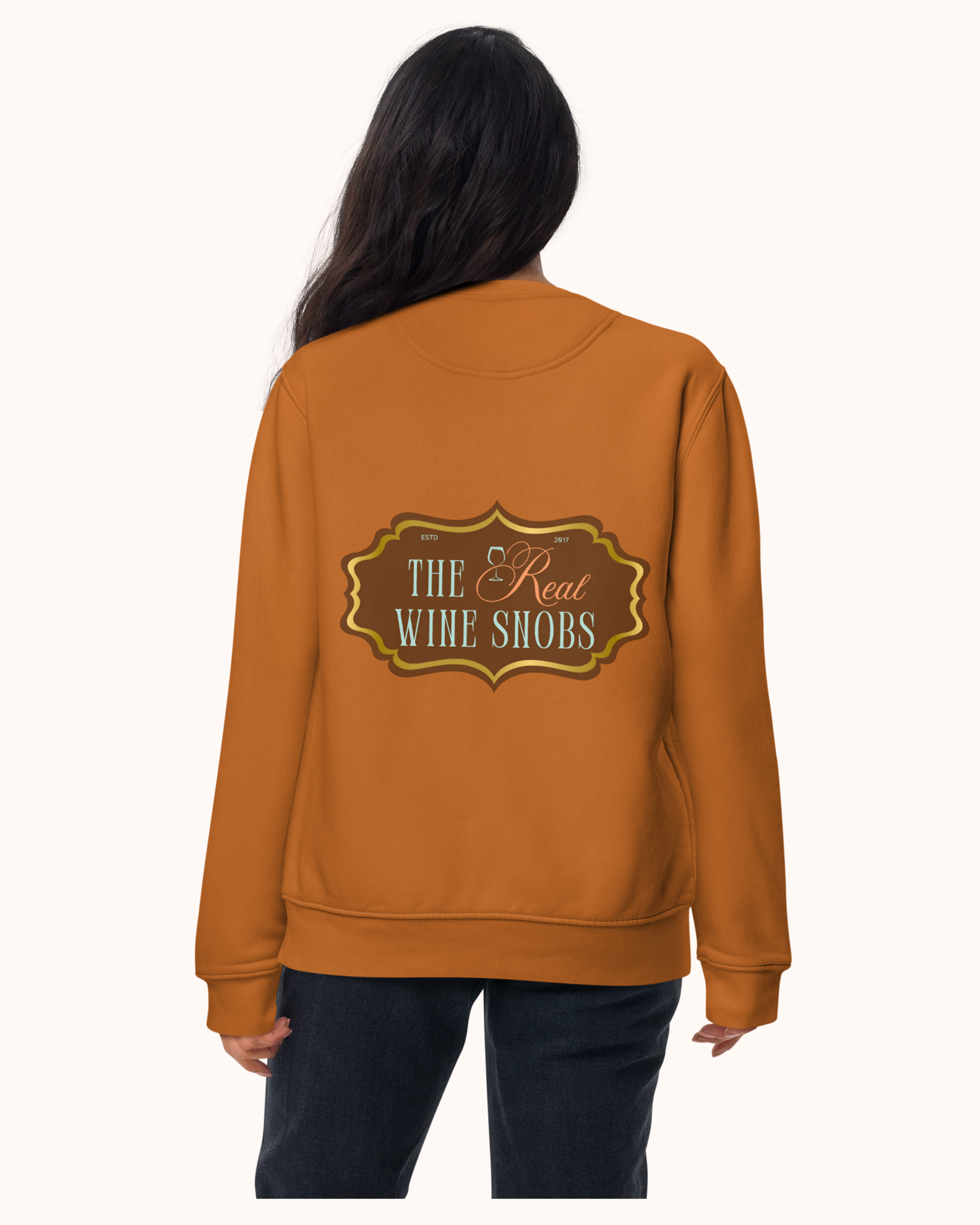 Premium wine sweatshirt with “Making Pour Decisions Since 2017” on the front and The Real Wine Snobs logo on the back. Structured unisex fit with cotton face and fleece interior. Sizes S–3XL.