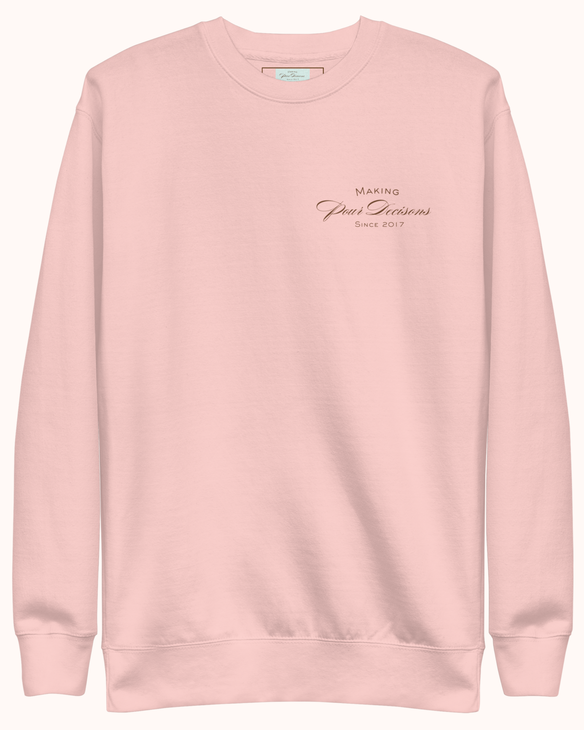 Premium wine sweatshirt with “Making Pour Decisions Since 2017” on the front and The Real Wine Snobs logo on the back. Structured unisex fit with cotton face and fleece interior. Sizes S–3XL.