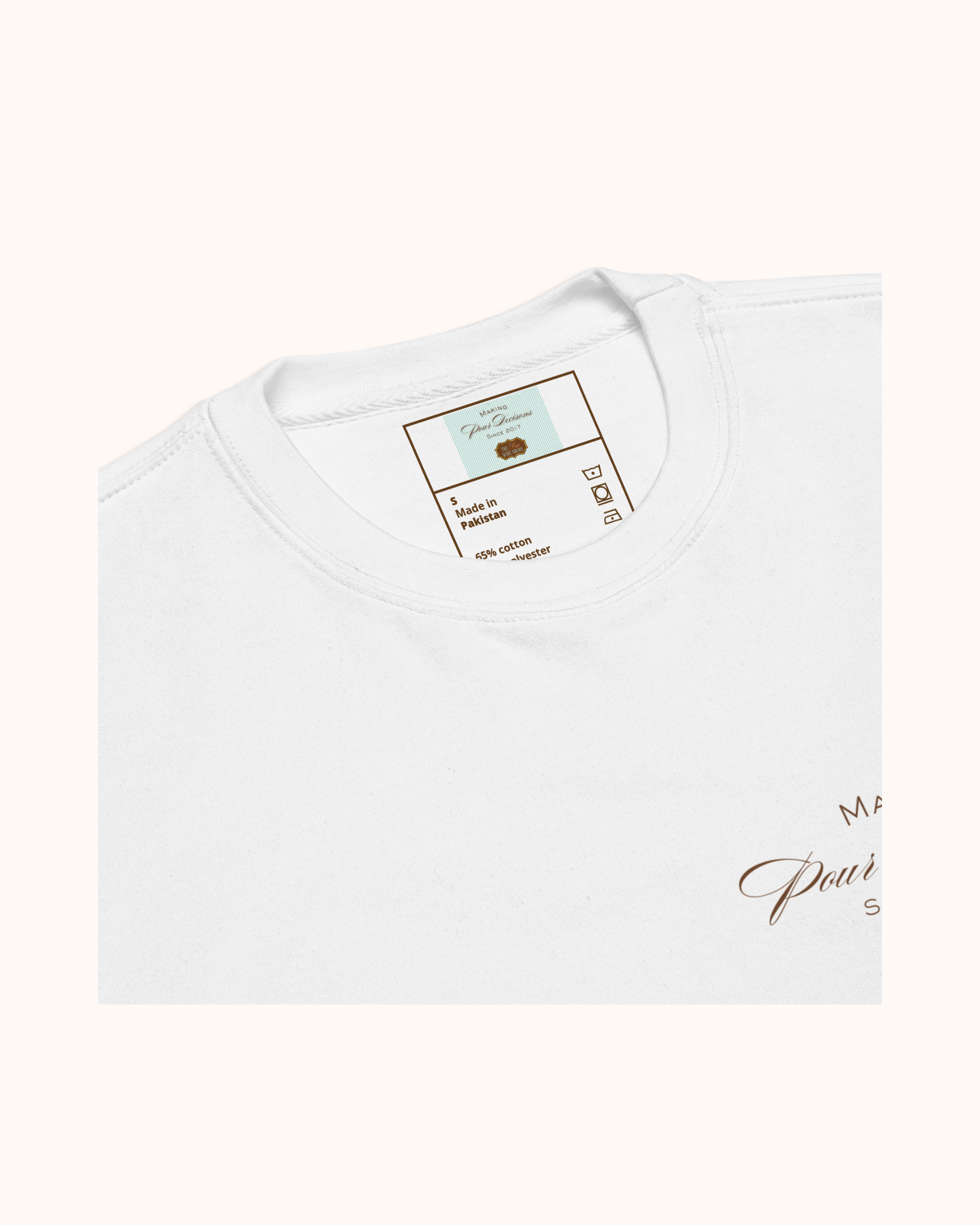 Premium wine sweatshirt with “Making Pour Decisions Since 2017” on the front and The Real Wine Snobs logo on the back. Structured unisex fit with cotton face and fleece interior. Sizes S–3XL.