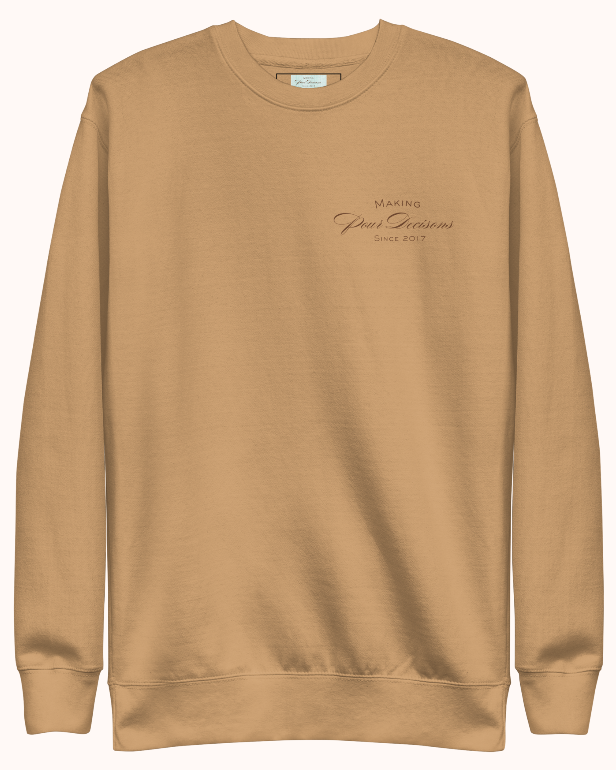 Premium wine sweatshirt with “Making Pour Decisions Since 2017” on the front and The Real Wine Snobs logo on the back. Structured unisex fit with cotton face and fleece interior. Sizes S–3XL.
