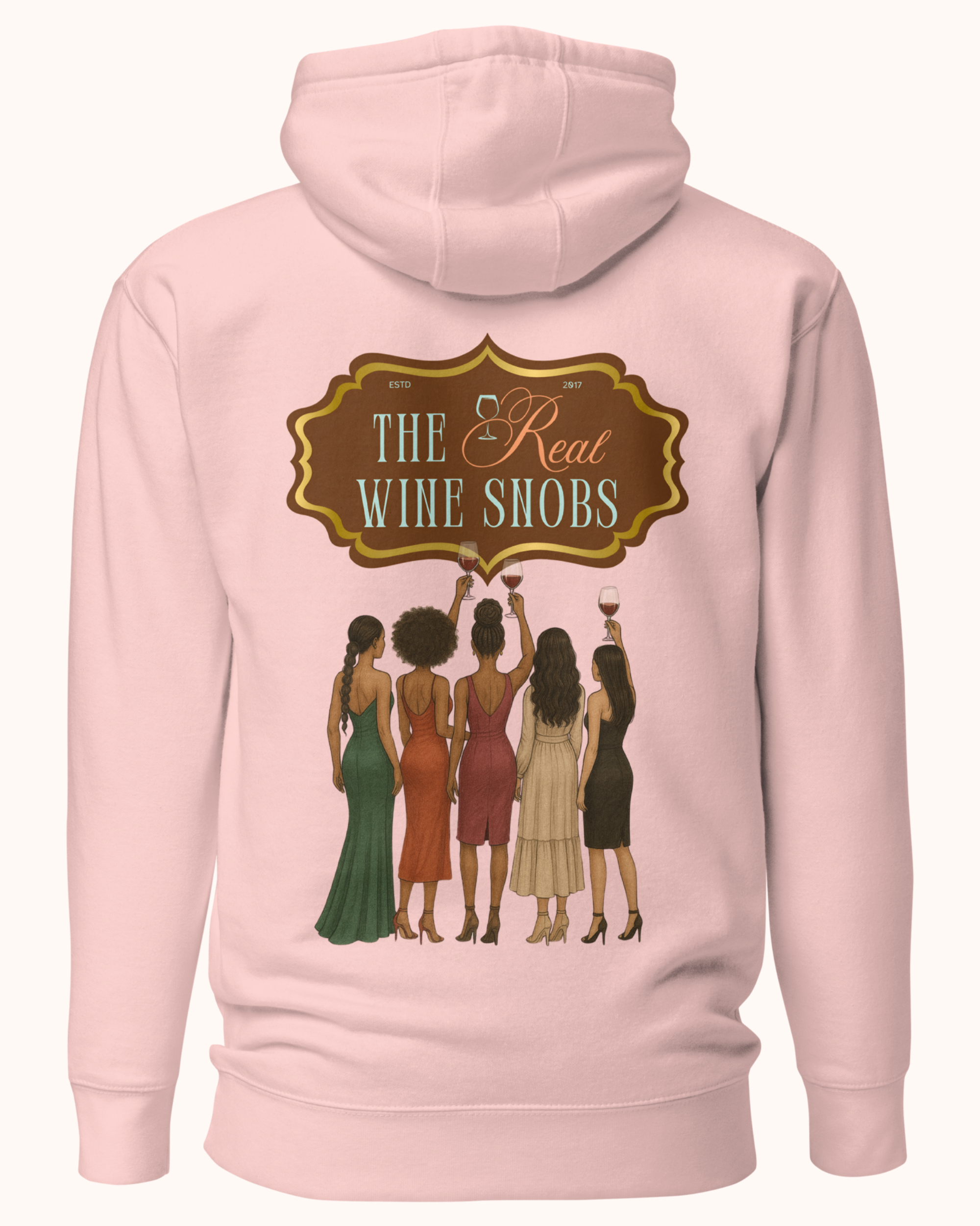 The Real Wine Snobs Snob Hoodie features women raising wine glasses beneath the brand crest. A fleece-lined hoodie designed for tastings, girls’ nights, and wine lovers with a little attitude.