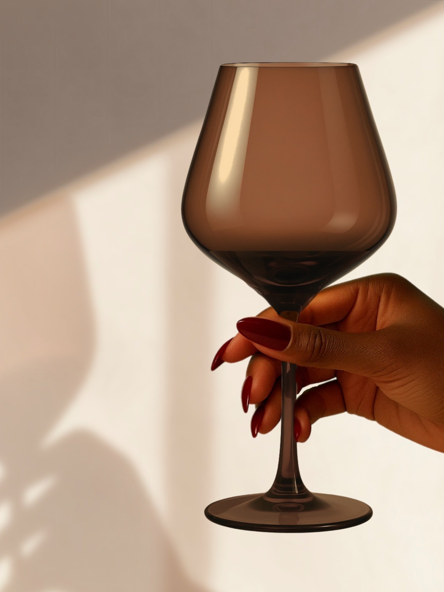 Moody and refined, these hand-blown brown crystal glasses come in a set of 4. Designed to sip and flex—because real wine snobs don’t do basic.