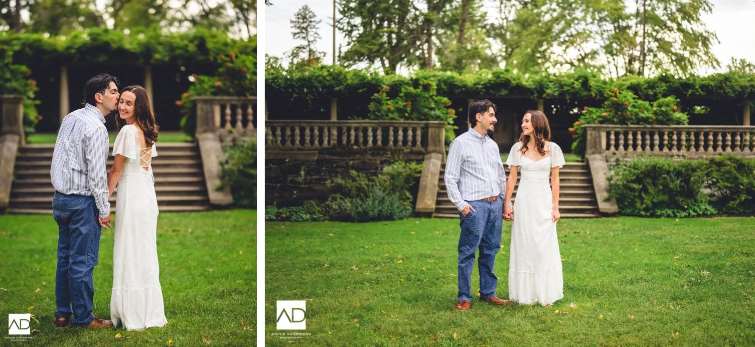 Joe stealing a kiss on Emily's cheek as she grins on the Curtis Arboretum lawn — Montgomery County wedding photographer