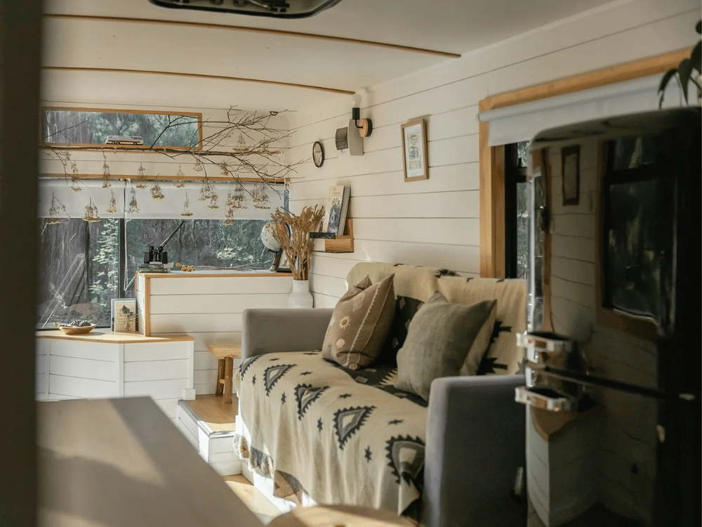 cosy interior of converted bus accommodation near Melbourne Victoria