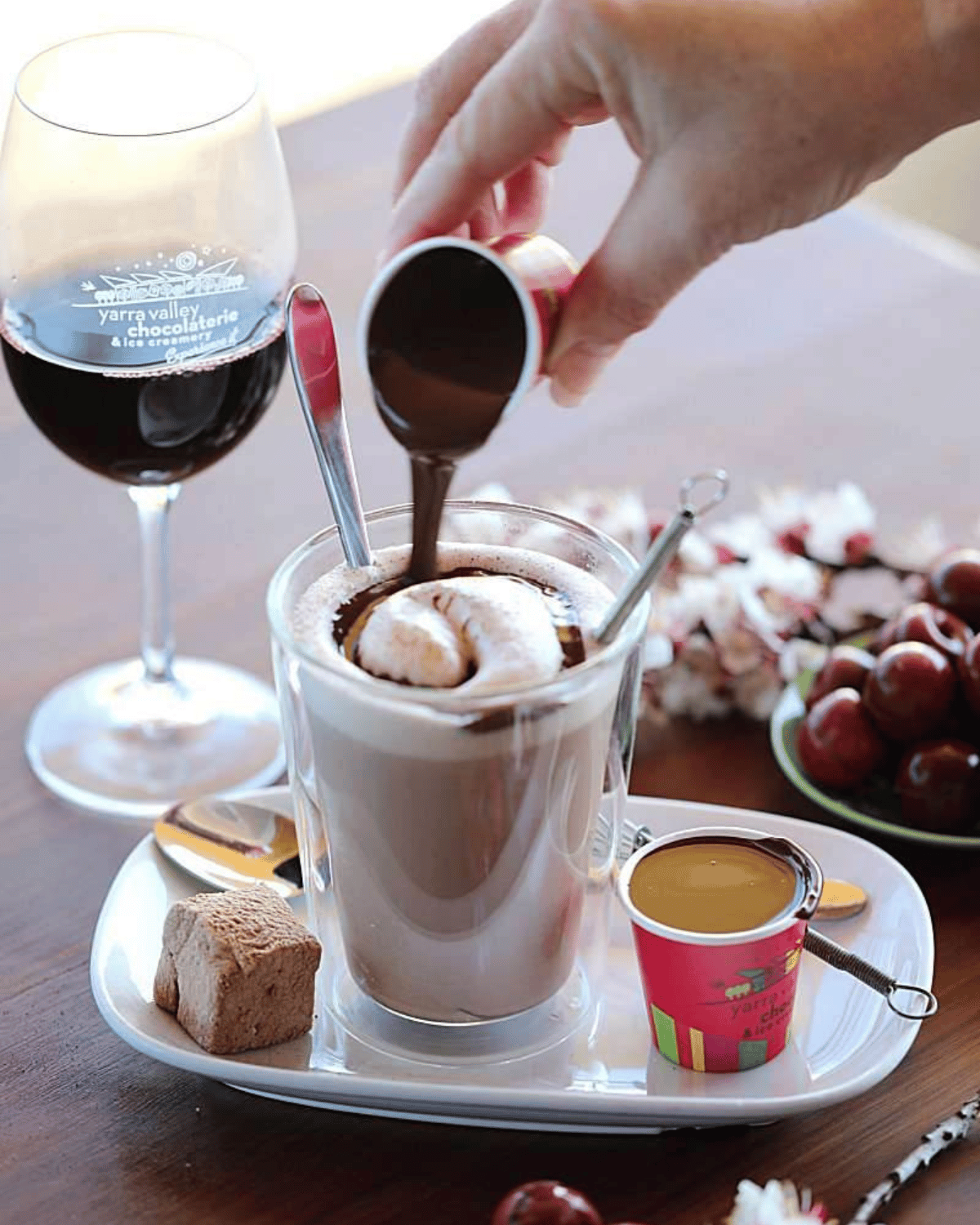 Rich hot chocolate being poured at Yarra Valley Chocolaterie and Ice Creamery, served with marshmallows and Turkish delight