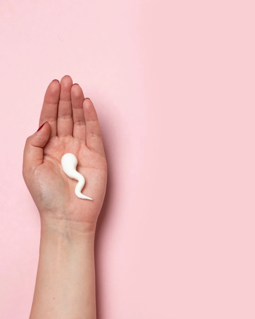 image of a women's had with a fake sperm