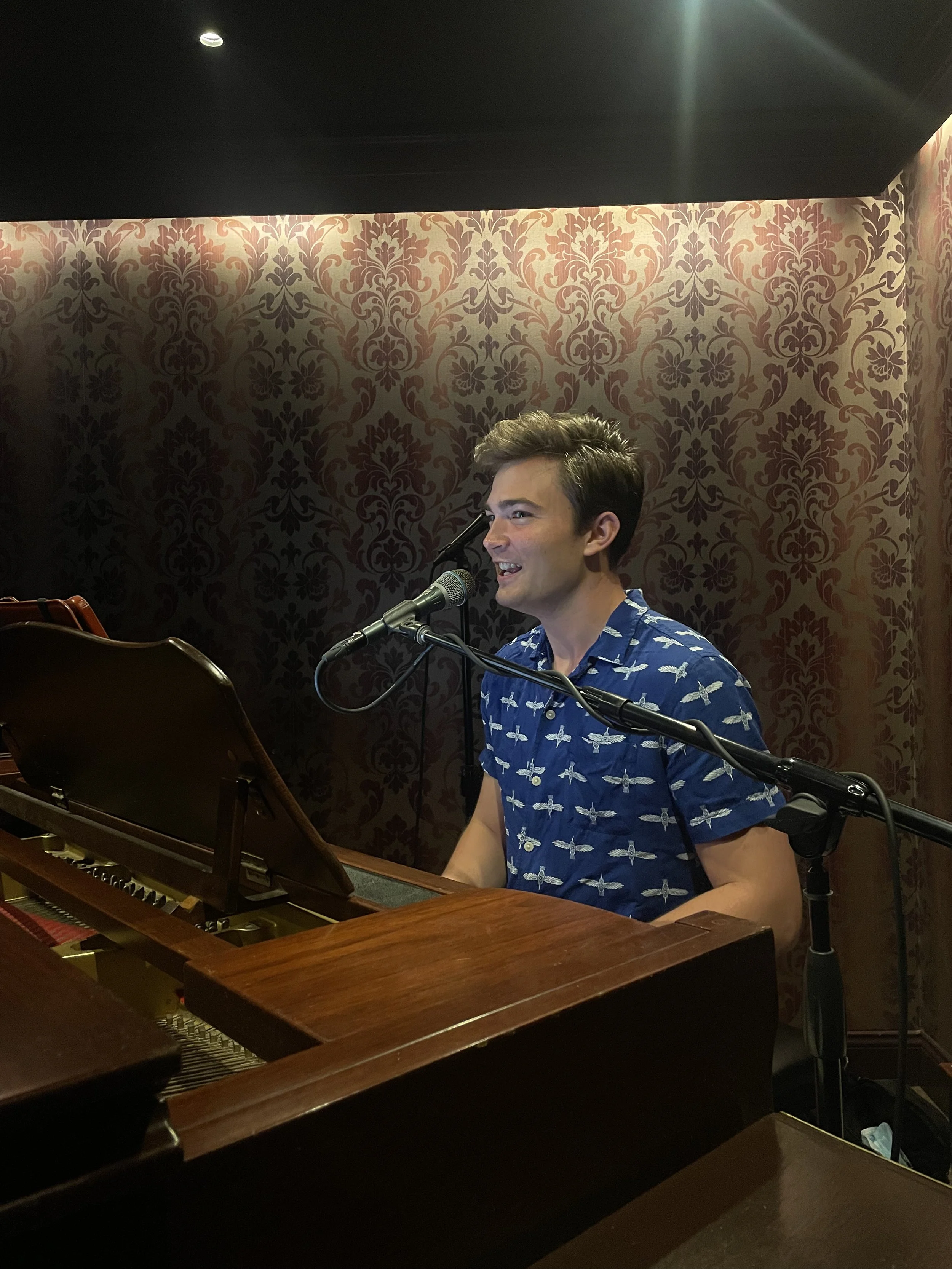 Giacomo playing and singing at Tavern on Camac