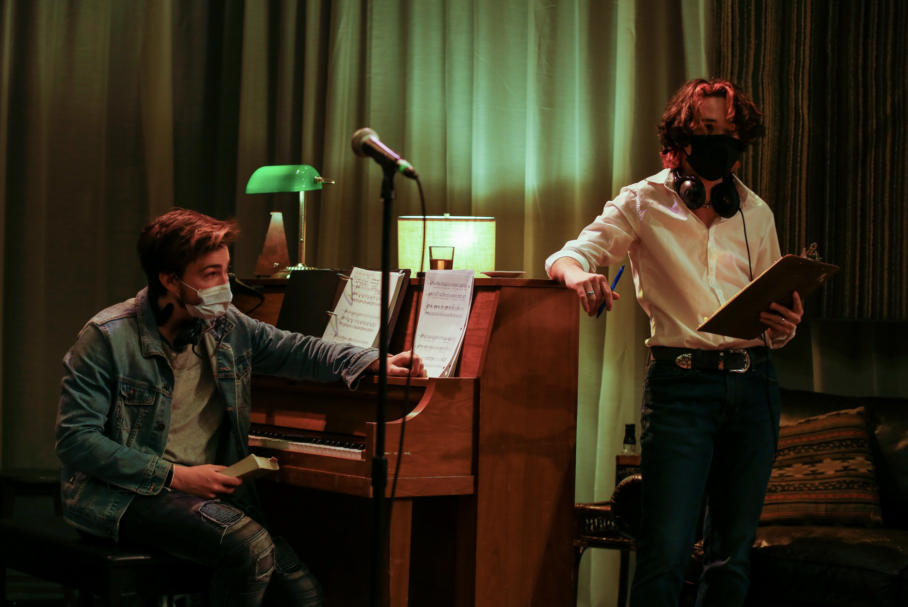 Giacomo playing piano with a mask on
