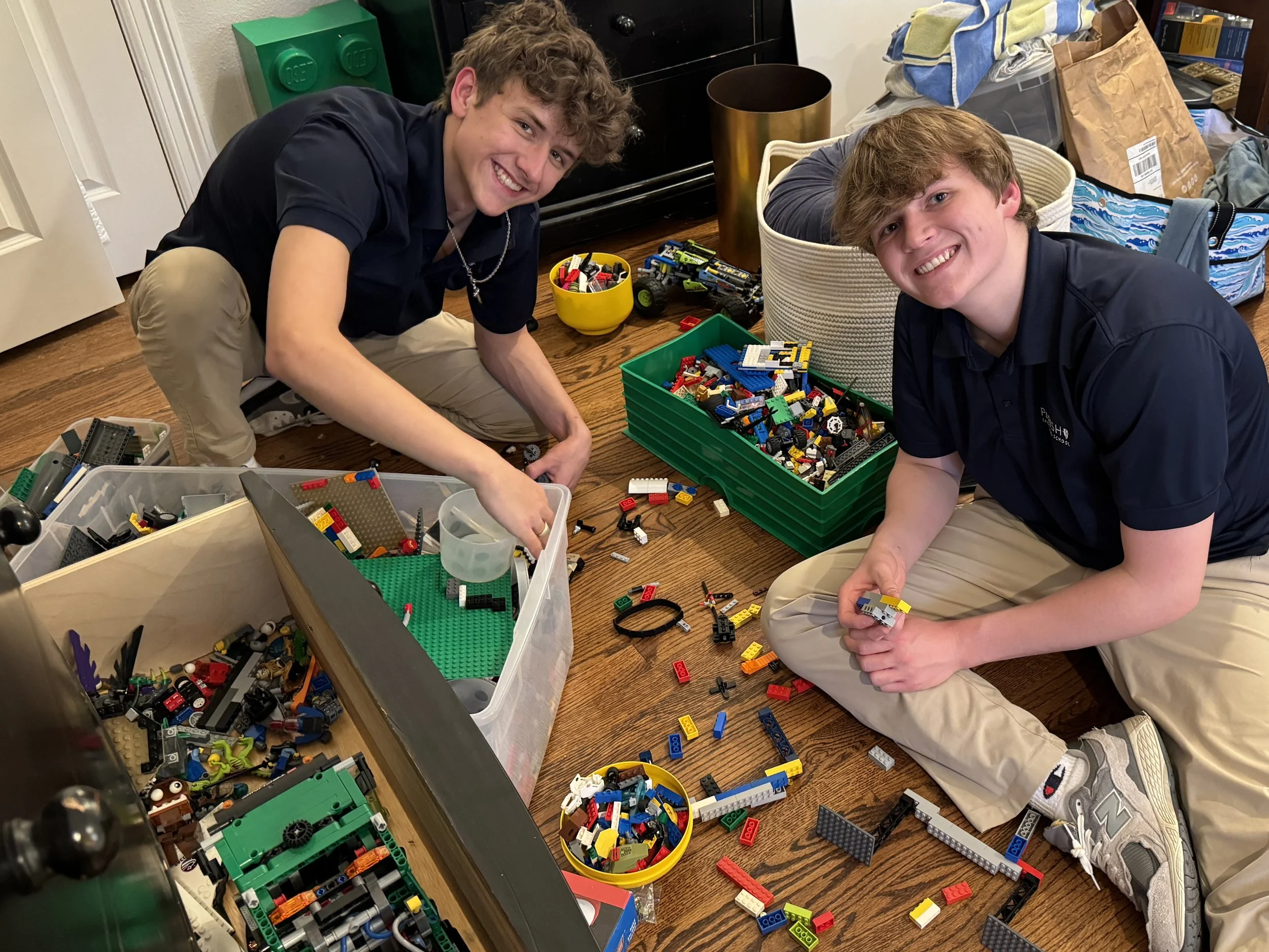 Teenager working on advanced LEGO Technic robotics set