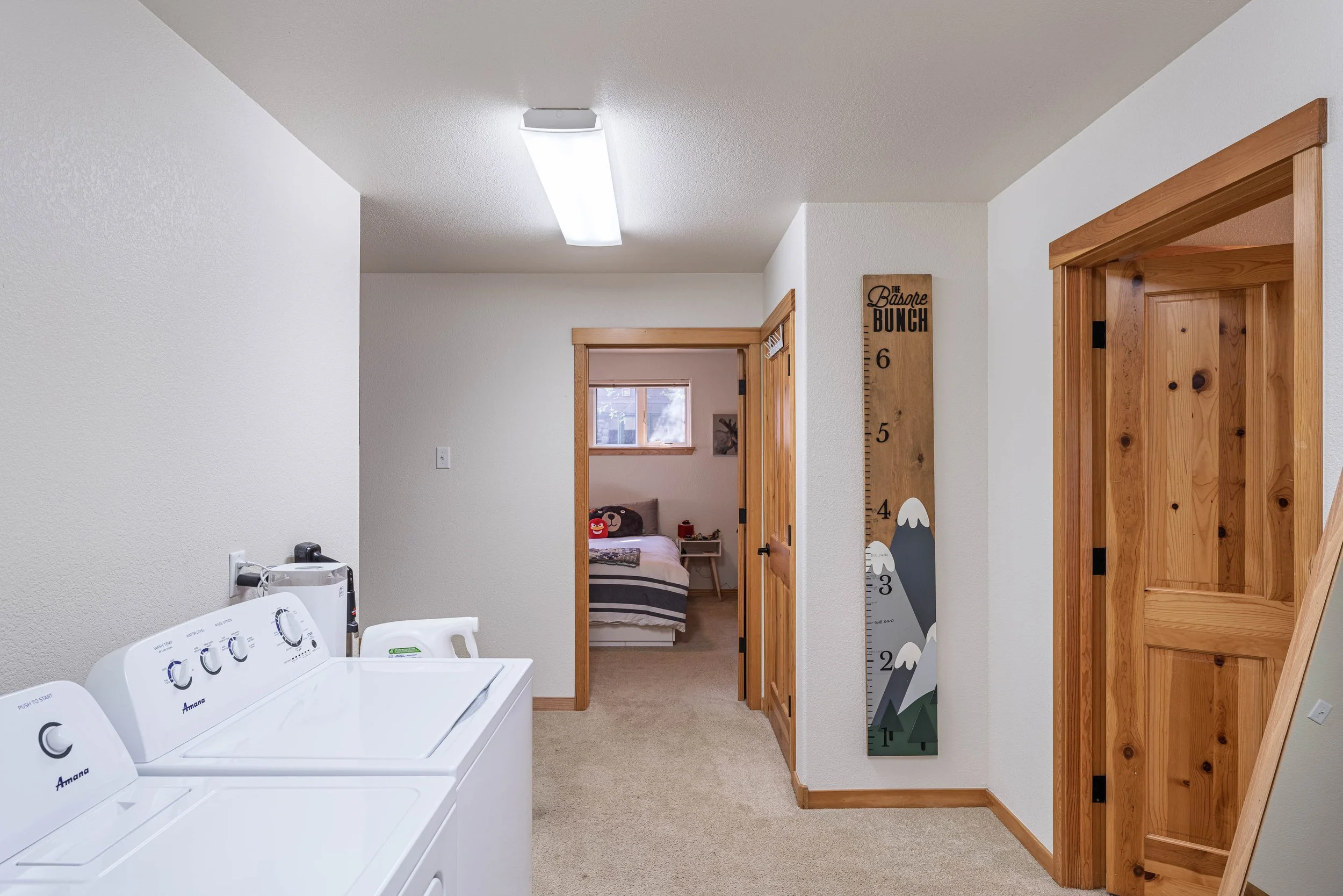 Lower Level Guest Rooms + Laundry