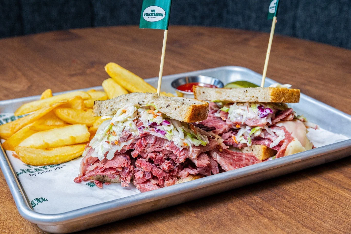 Brooklyn called&mdash;said we better pile it high 🥪 ⁠
⁠
The Brooklyn Combo&mdash;pastrami + corned beef + provolone + coleslaw 🗽Order it regular&hellip;or go full Bada-Bing with double the meat! ⁠
&bull;⁠
&bull;⁠
&bull;⁠
#TheDelicatessen #Pastrami 