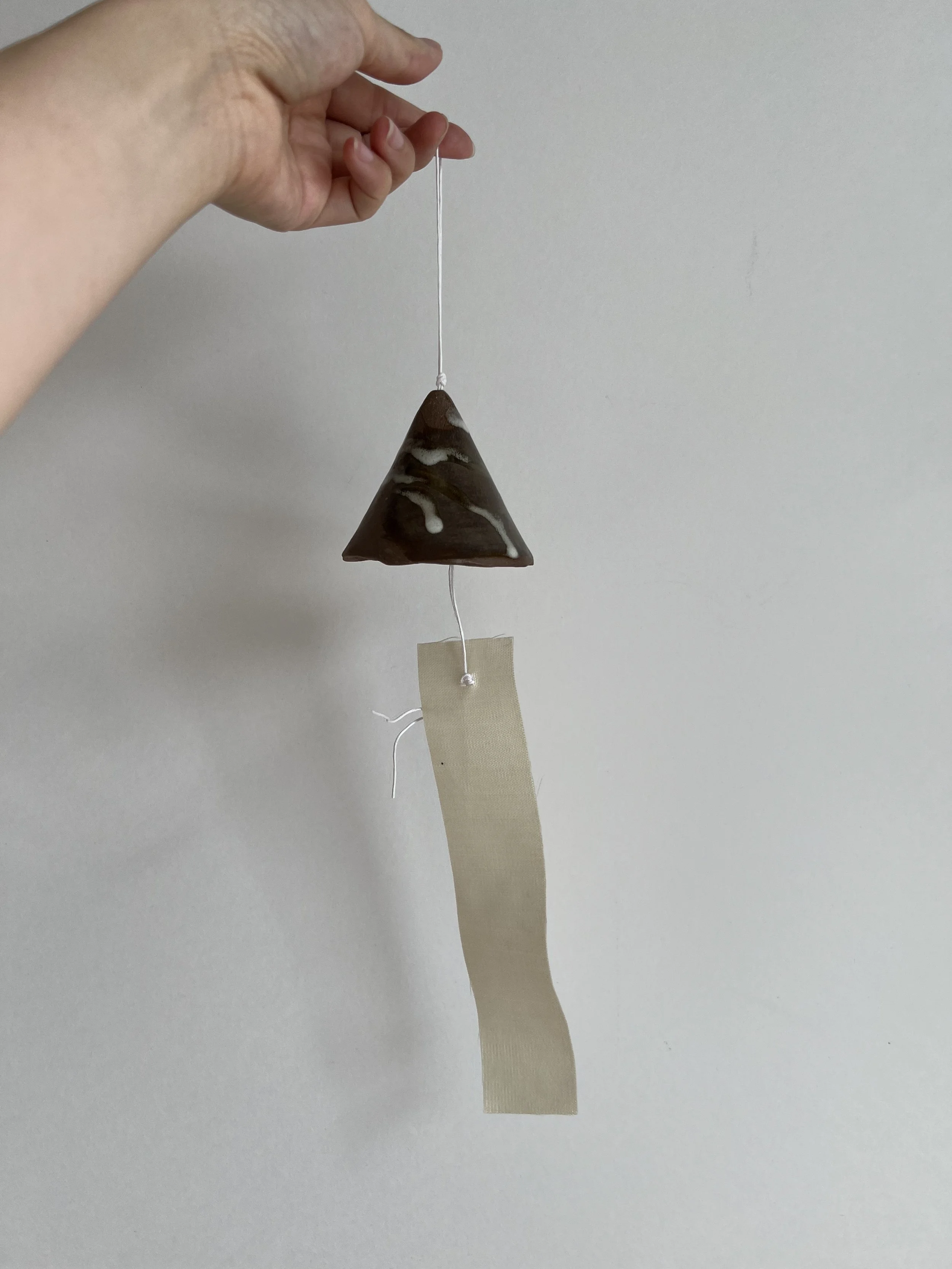 [W4] brown triangle wind chime