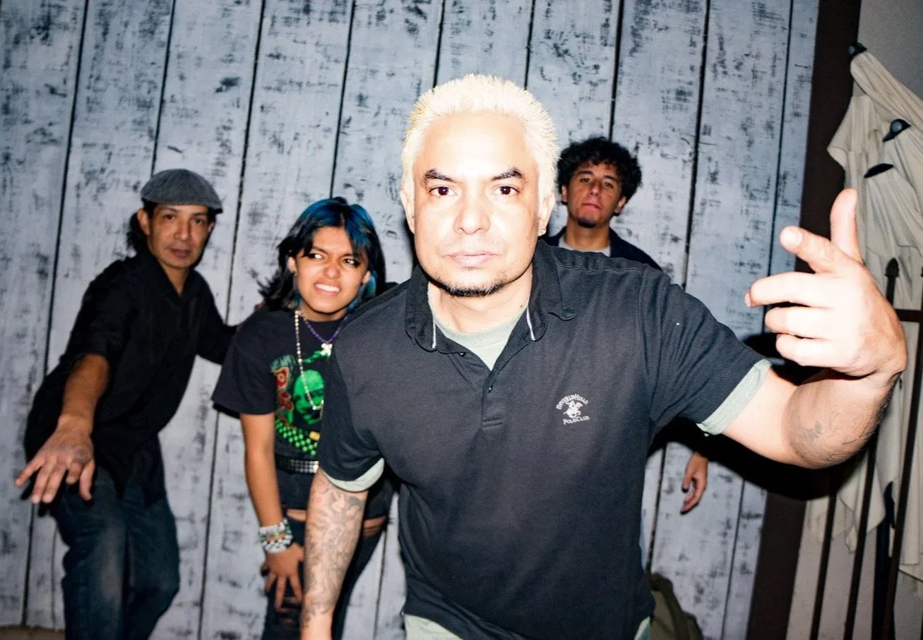 Skunkdub and The High Influence posing for a picture 