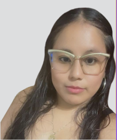 Close-up of a woman with long dark hair wearing glasses and a beige top against a light background.