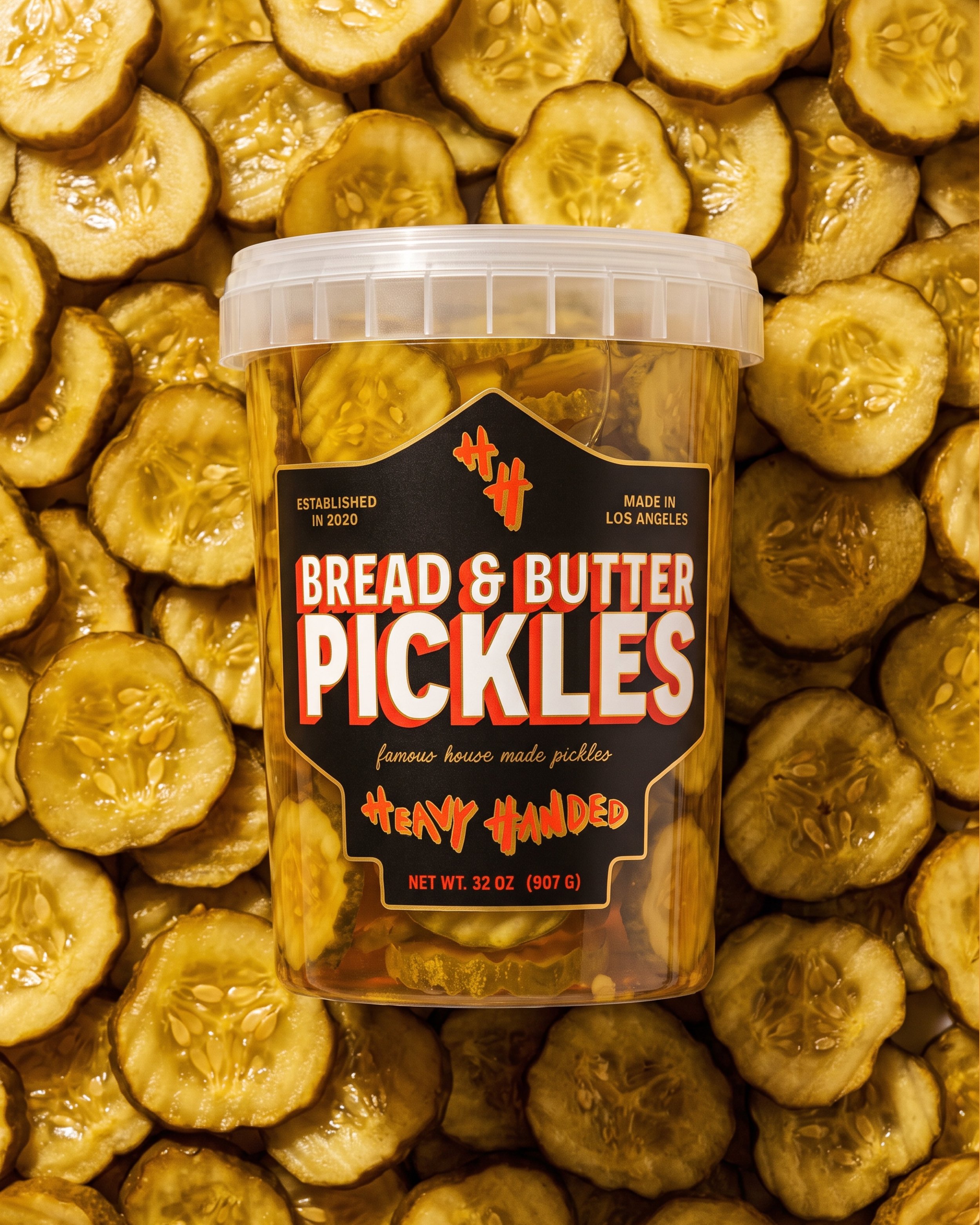 &bull; label work for @heavyhanded.la bread &amp; butter pickles. custom die-cut shape and raised gold foil details bringing that heavy energy.

#packagingdesign #restaurantdesign #hospitalitydesigner