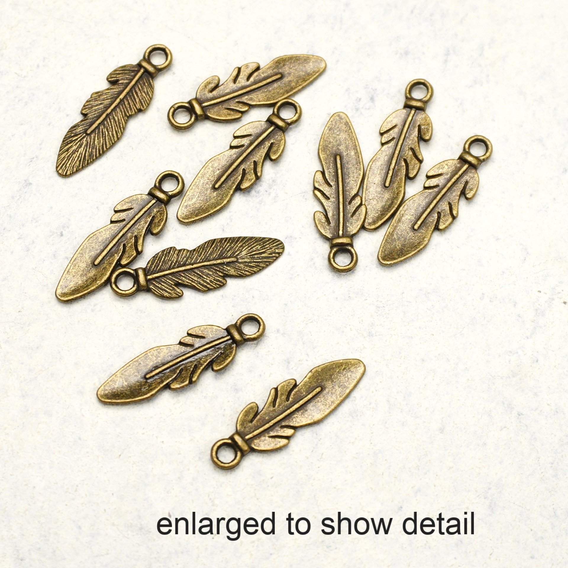 bronze toned feathers2.jpeg