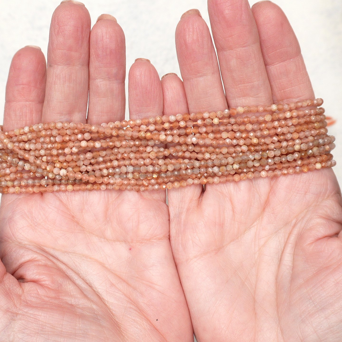 Sunstone Tiny Round Faceted 3mm