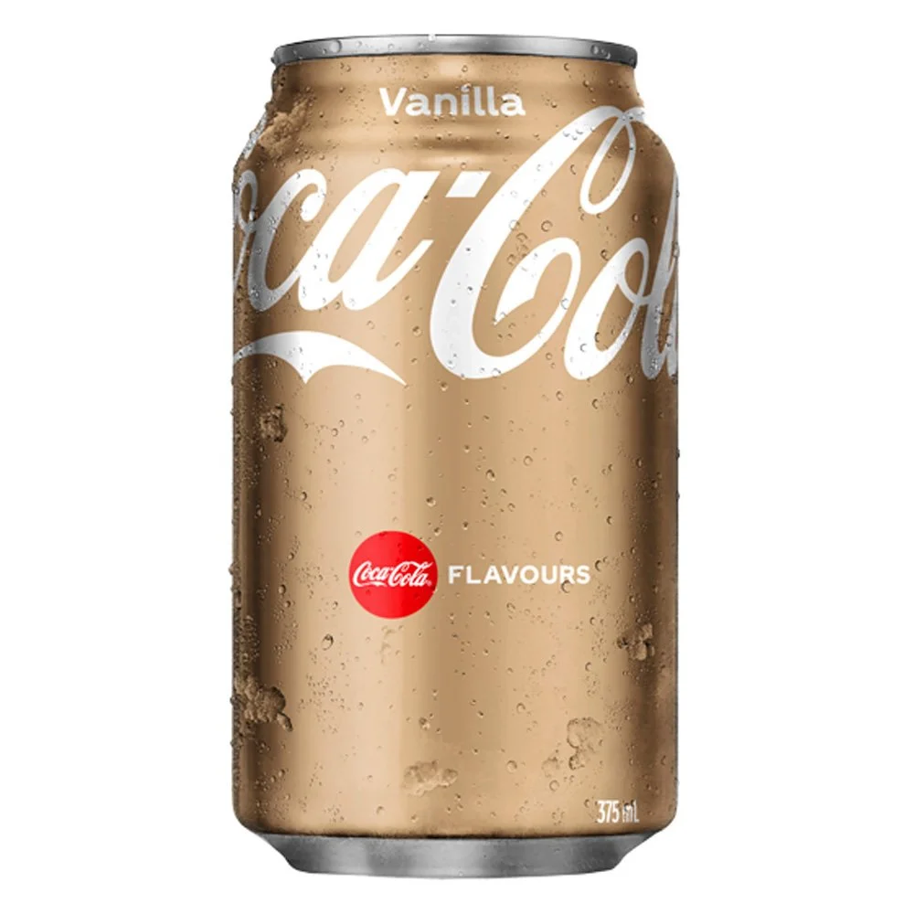 A can of Coca-Cola Vanilla flavored soda with condensation on the surface.